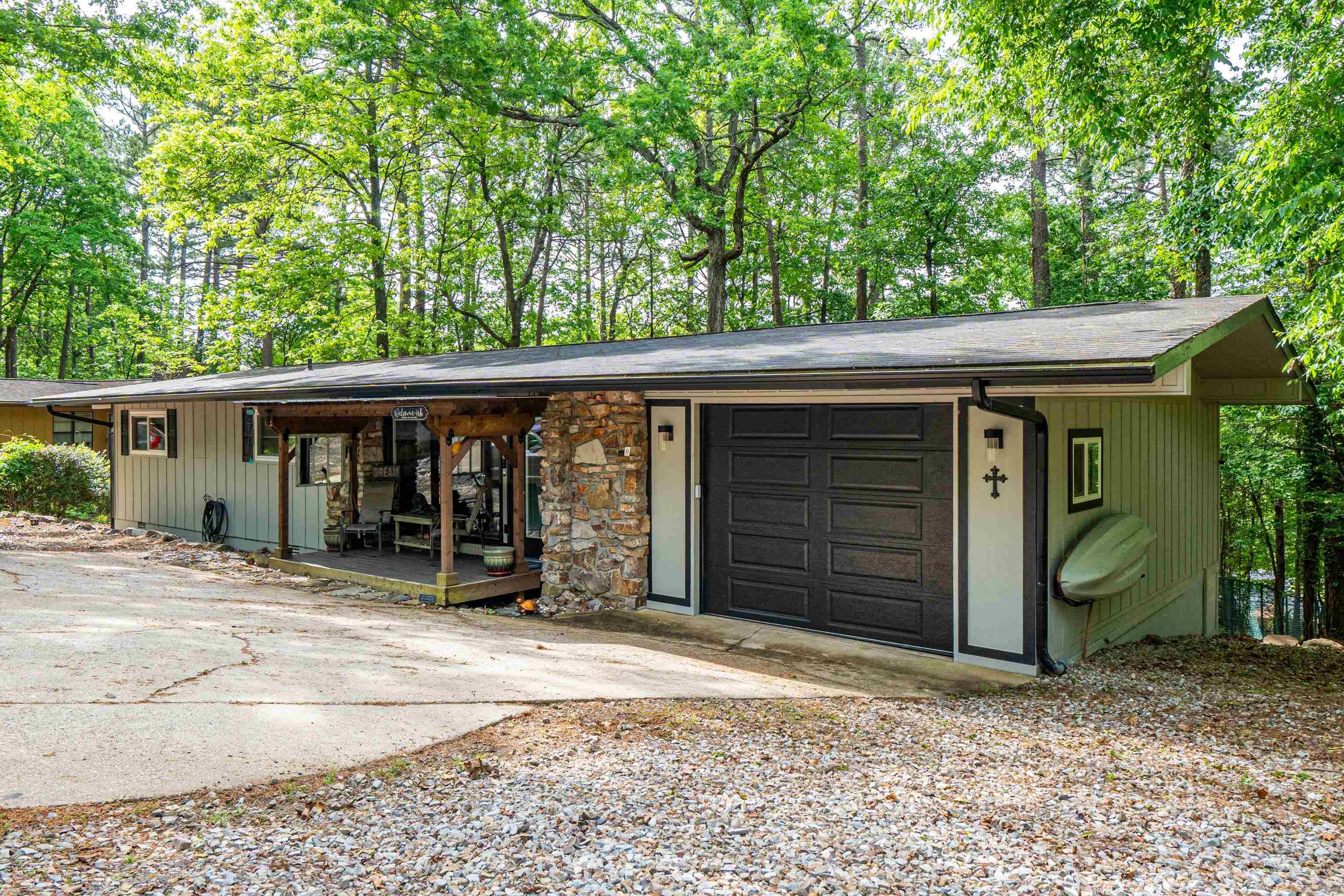 A wonderful 3/2 located in Hot Springs Village. It has been updated with granite countertops and pergo floorings, new windows, hot water heater, walk-in closets in every bedroom and walk-in shower in primary bath. There is an unfinished basement thats is great for storage. The village offers so many amenities including - golf courses, lakes, and walking trails. There is a buy in fee for first time buyers for the village.