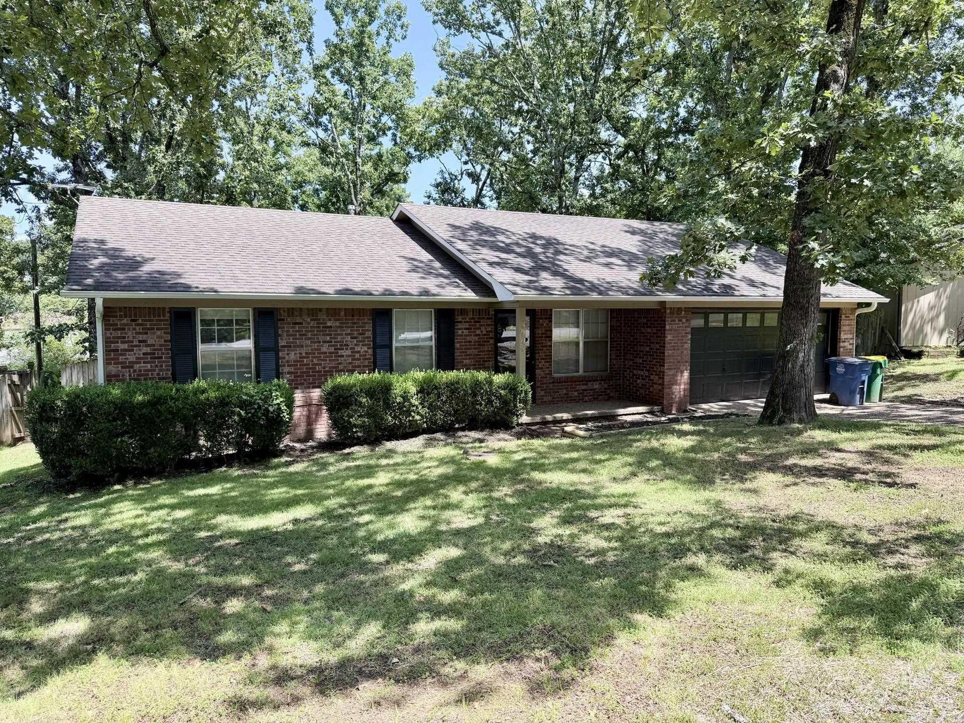 Welcome to this beautifully updated 3-bedroom, 2-bath home featuring a spacious 2-car garage and thoughtful upgrades throughout. The kitchen shines with new stainless steel appliances, granite countertops, and updated fixtures, while fresh flooring and paint create a clean, modern feel across the entire home.  Enjoy peace of mind with an HVAC system that is only a few years old. The inviting living area includes a cozy fireplace, perfect for relaxing evenings. A versatile bonus room just off the garage offers the ideal space for a workshop, craft room, or additional storage.  Step outside to a fully fenced backyard designed for both privacy and entertaining, complete with an impressive 450 sq ft deck featuring built-in seating—perfect for gatherings or quiet mornings.  Move-in ready and full of value, this home is ready to welcome its next owner.  No SPD; seller has never occupied the property.