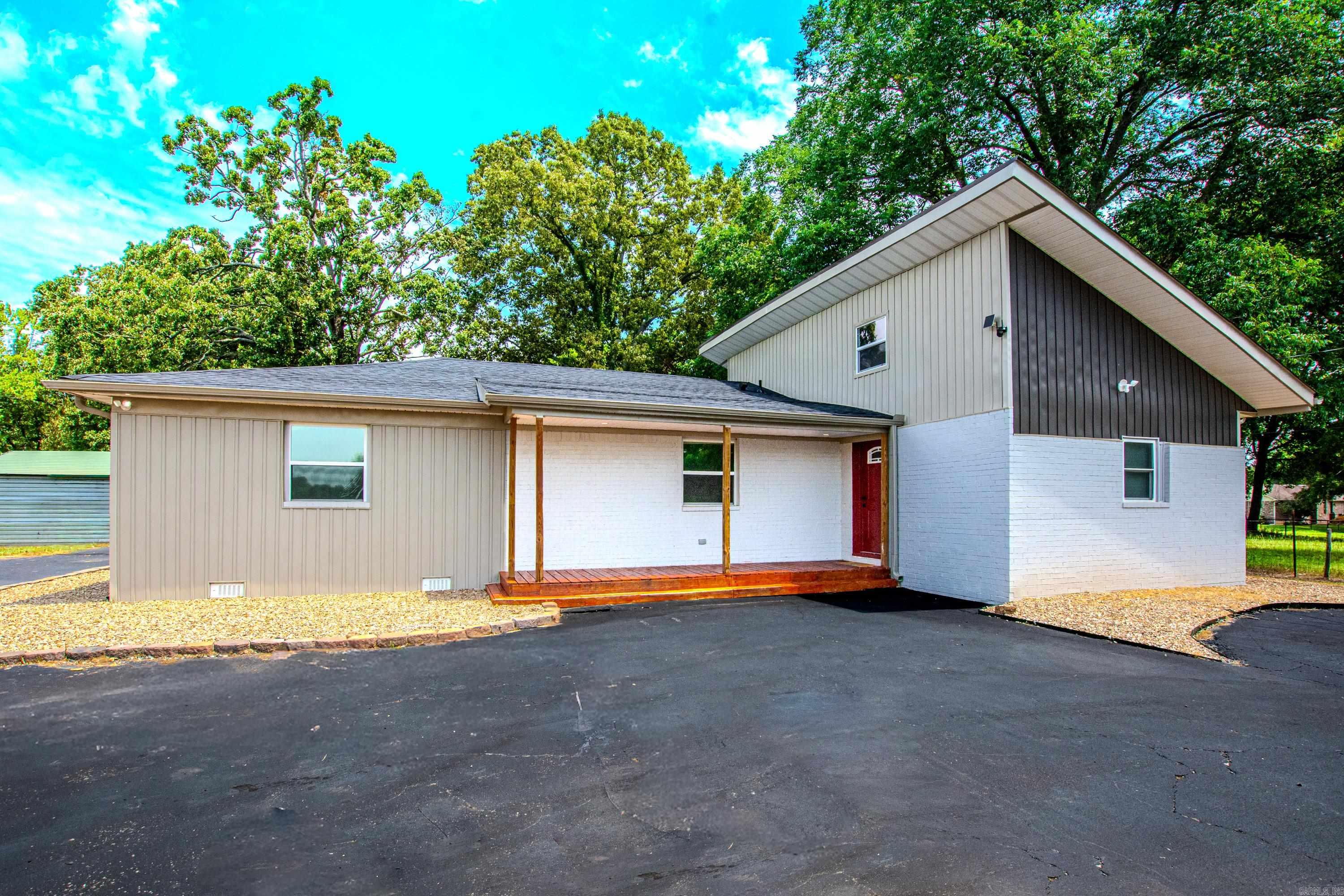 This recently updated home in Cabot offers a spacious living area, four bedrooms, three full bathrooms, and a convenient office or small bedroom. A laundry room is also included for added convenience. The beautiful kitchen boasts ample storage and new appliances. Nestled on a lovely 1.97-acre property, the house provides ample outdoor space for relaxation and recreation. Additionally, the house features a large shop, enhancing its charm and functionality. provided in agent remarks is a detailed list of renovations