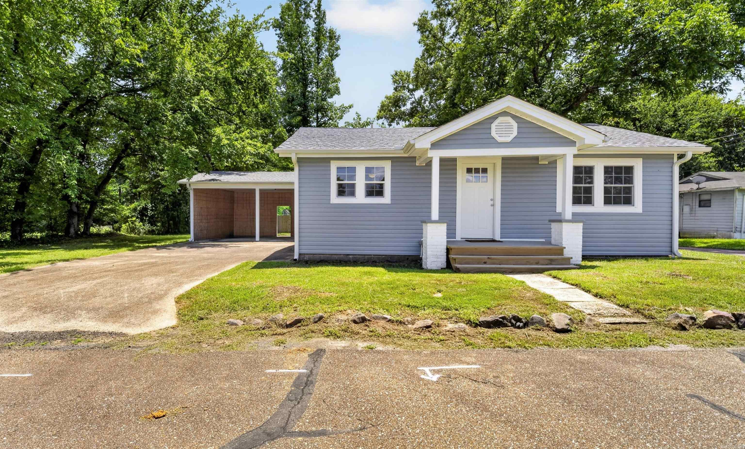 Completely remodeled and move-in ready! This beautifully updated 3-bedroom, 2-bath home offers approximately 1,551 square feet of comfortable living space and has been renovated from top to bottom in 2025. Major improvements include a new roof, siding, windows, HVAC system, updated plumbing, electrical upgrades, new flooring, and new appliances. The functional floor plan provides spacious living areas, while the covered parking adds everyday convenience. Enjoy outdoor living in the privacy-fenced backyard, perfect for pets, play, or entertaining. Conveniently located near Henderson State University, Ouachita Baptist University, Arkadelphia Public Schools, shopping, dining, medical services, and Interstate 30. With major systems already updated, this home offers peace of mind and exceptional value for buyers seeking a turnkey property. Schedule your private showing today!