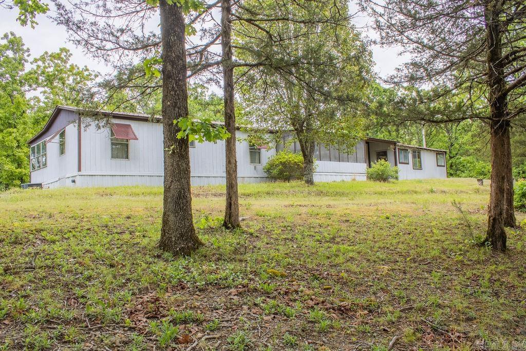 Hard-to-find affordable home on 4+/- acres in Mena, Arkansas. This 1,440 sq. ft. 2-bedroom, 1-bath mobile home offers the kind of peaceful setting buyers are always looking for, along with multiple sheds and a large deck to relax and take in the scenery. With room for gardening, recreation, or a small hobby farm, this property gives you flexibility and space at a price that is getting tougher to find. Whether you want a full-time residence, private getaway, or investment opportunity, this property offers strong potential. Priced low and firm at $129,900 for a quick sale.