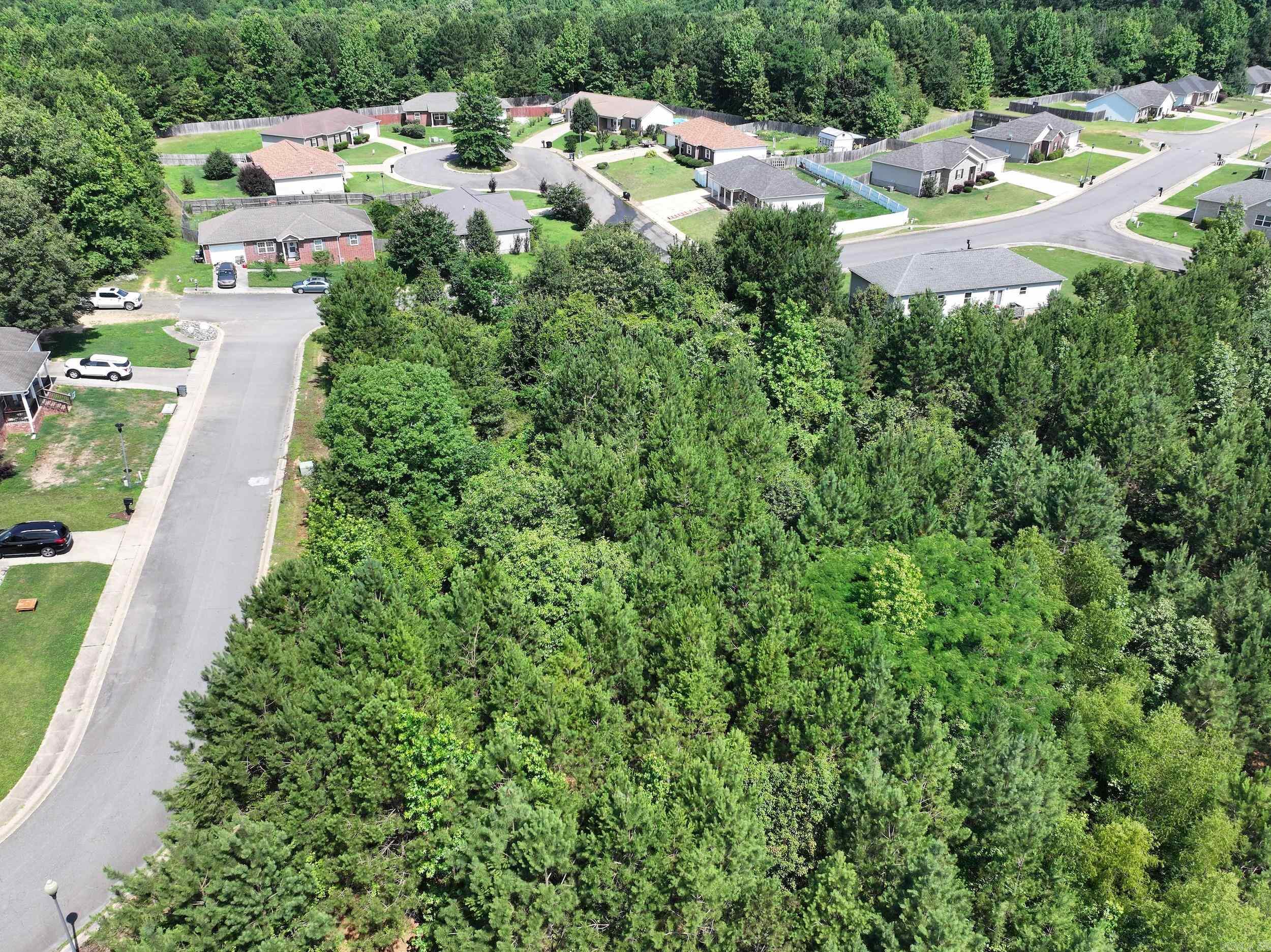 Discover this residential lot nestled in a conveniently located subdivision, just moments away from Walmart. With utilities readily available at the road, this lot eagerly awaits the construction of your new home.  Taxes are shown as $0.00. Buyer is responsible for verifying the current tax amount with the county.