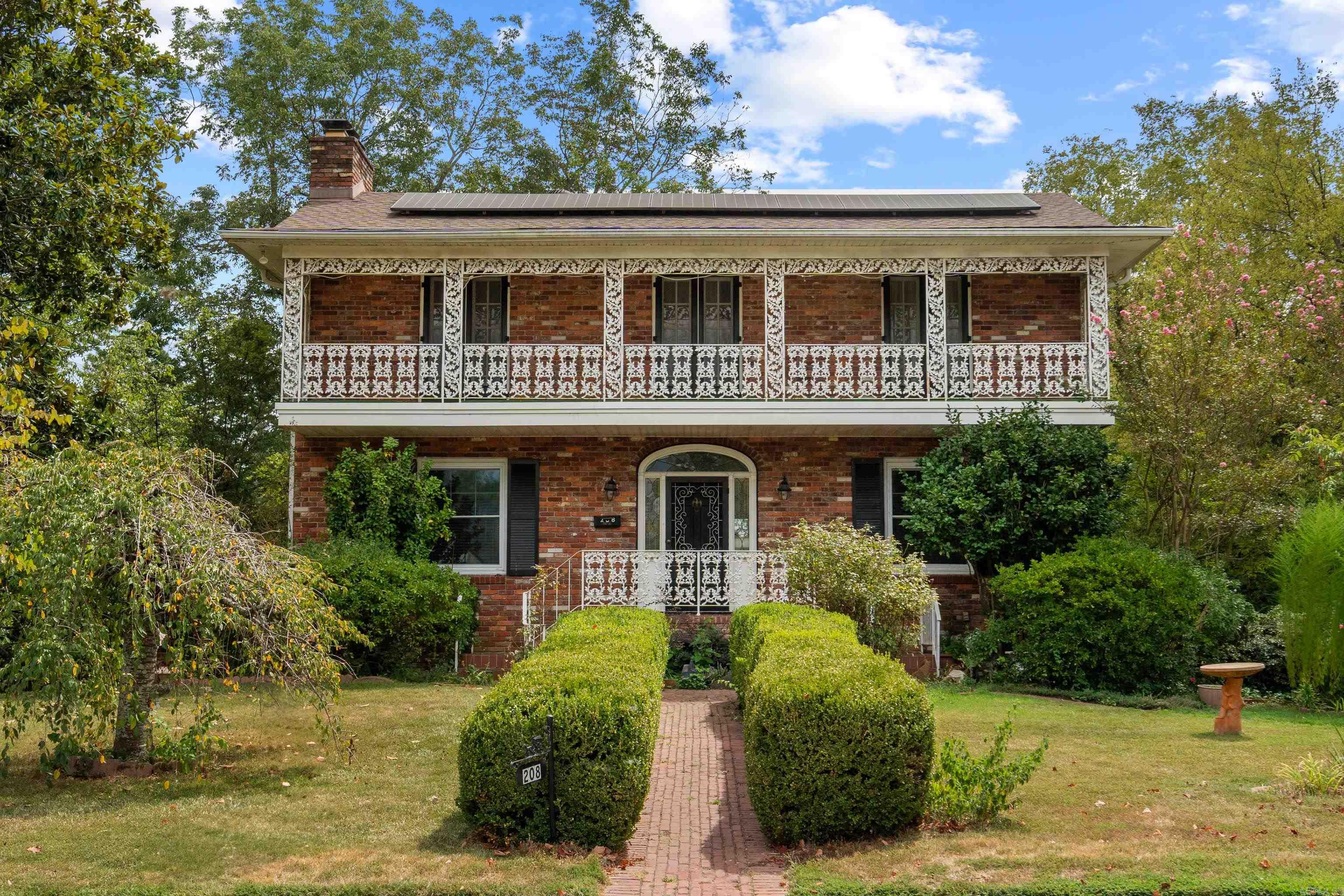 Location Location Location! Minutes from Oaklawn & in the heart of Hot Springs, this charming family home is waiting for you to make memories for years to come. 4 BR (downstairs can be 4th bdrm), 3.5 bath with plenty of room for everyone. Enjoy the beautiful landscape of a quiet large backyard, 3 car garage, sunroom, breakfast room, large living room & dining. Enjoy the outdoors with a walkout balcony from the main bedroom. Downstairs has an outdoor walkout which can also work as a private apartment.  Solar Panels. New paint on lower level.