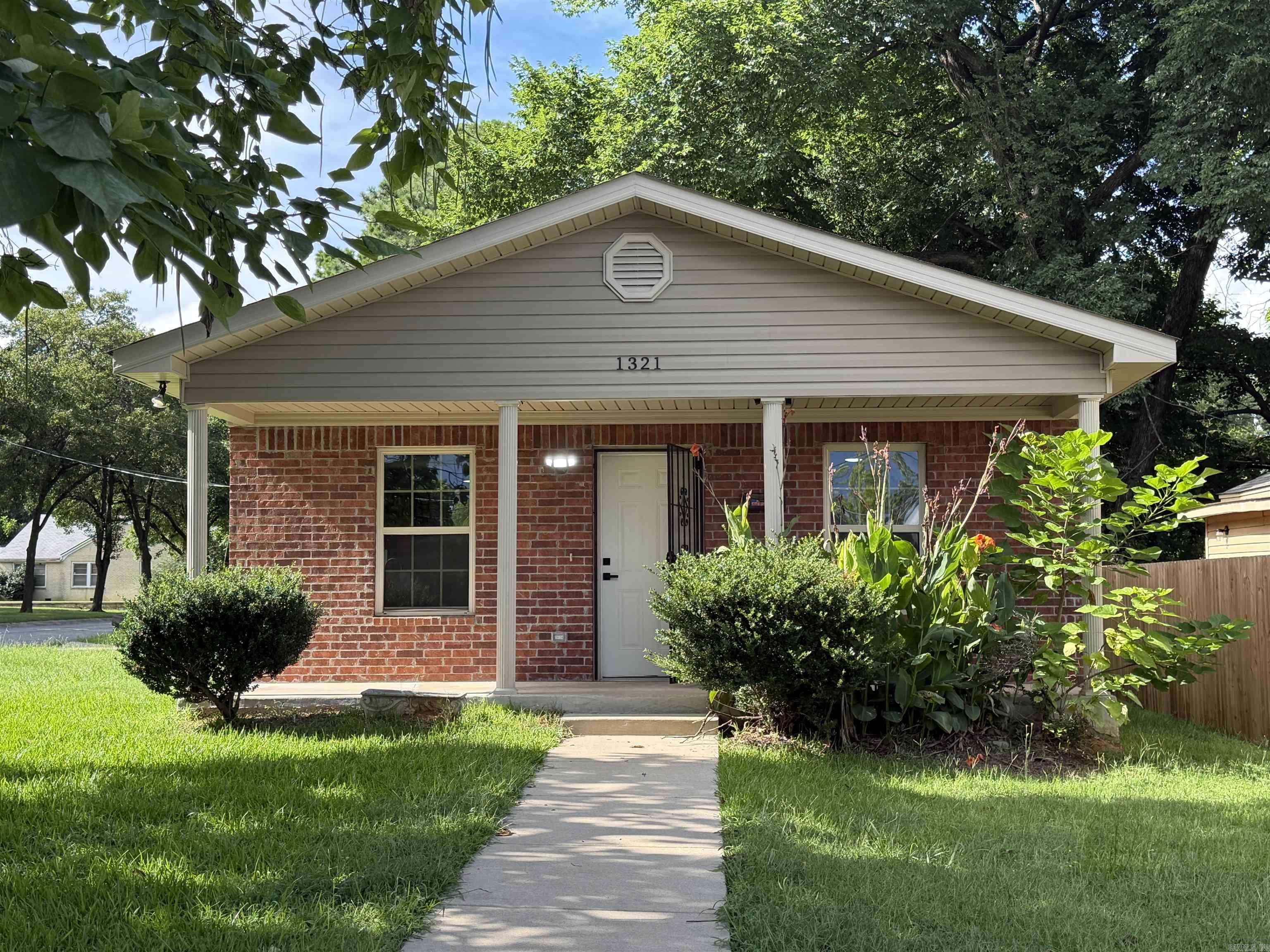 UPDATED one level 3 bed 2 bath with 1 car garage on nice flat corner lot. Convenient up and coming area, lots of redevelopment around, across the street from a church and a park area. Built in 2012 and updated in 2026 with new LVP flooring, paint, LED lights & fans, granite countertops, SS appliances.  All electric. Ready to move in. Like a new house but under $100/ft. Beautiful huge catalpa tree in front yard. See agent remarks.