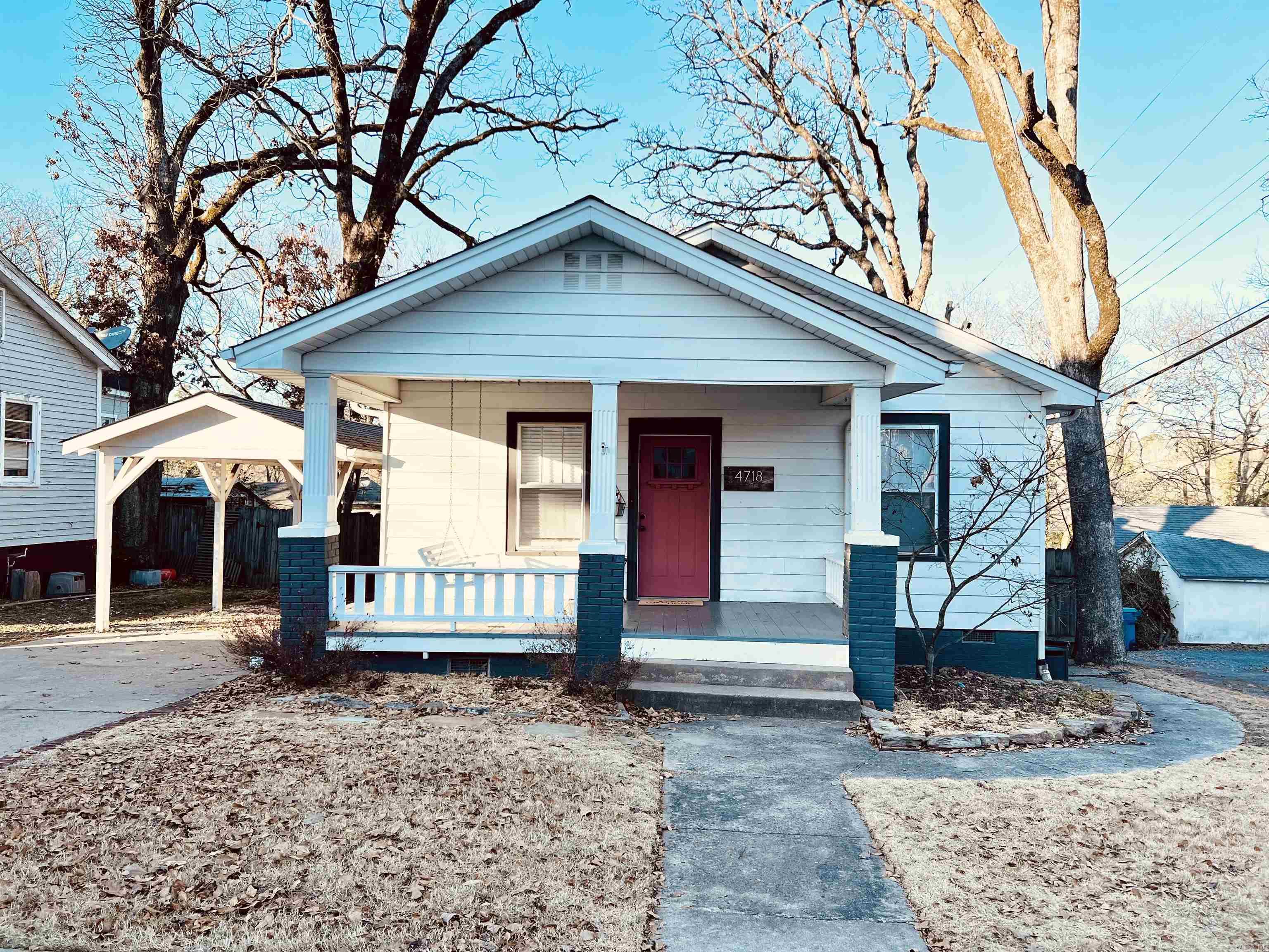 Wonderful home in Hillcrest! Covered front porch with front porch swing, two living areas with room for a large dining table, updated kitchen and baths, super cool outdoor entertaining area downstairs, carport. Easy walk to restaurants and shops close by.