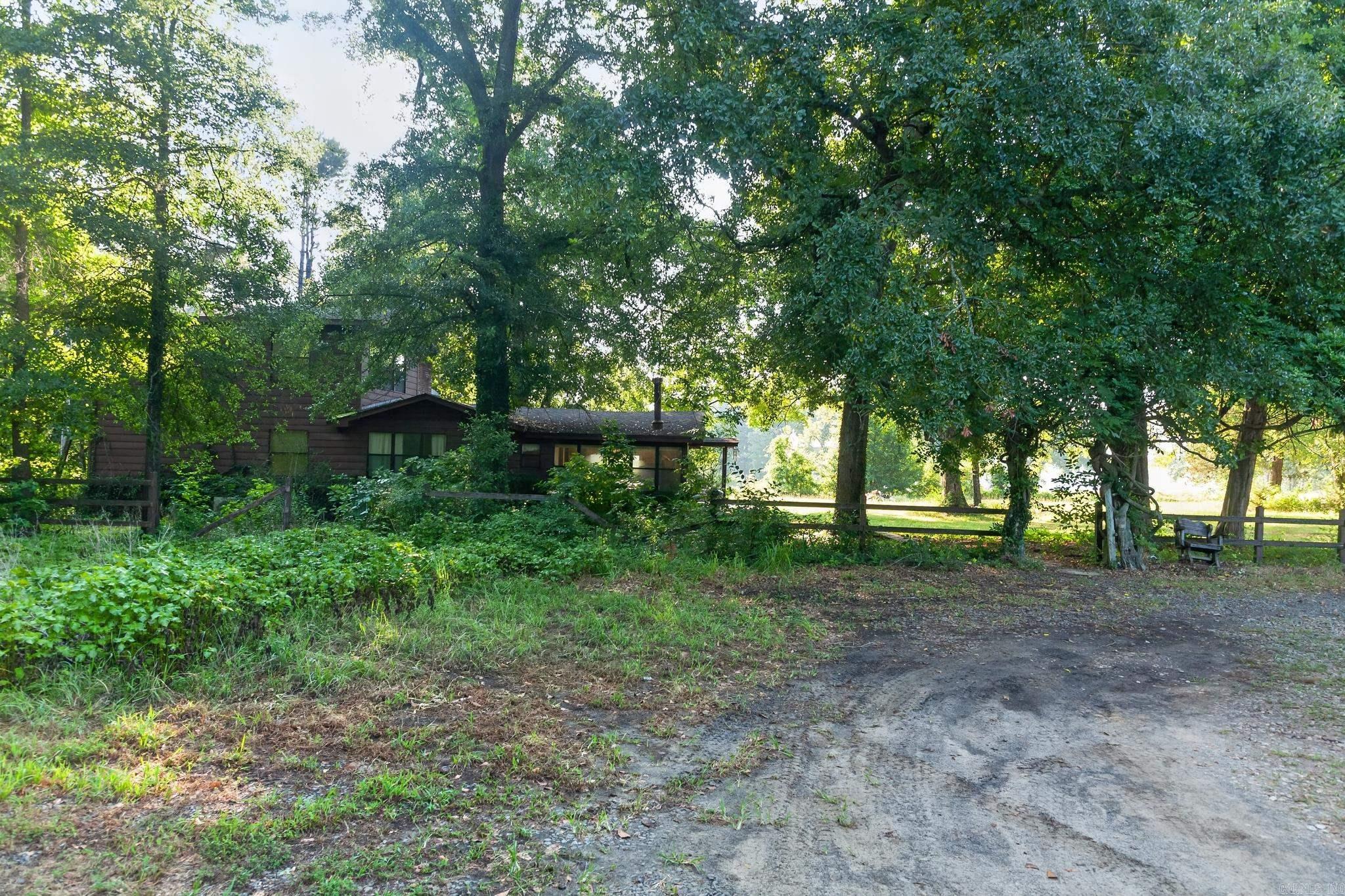 Bring your vision and unlock the potential of this two-story fixer-upper on beautiful Lake Dardanelle! Offering 3 bedrooms, 3 full bathrooms, and a cozy wood-burning fireplace, this home is ready for anyone looking to create their lakeview retreat. The spacious layout provides plenty of room to reimagine and customize, while the unbeatable lake location offers the chance to enjoy the peaceful lifestyle that comes with lake living. Whether you're searching for your next renovation project, a vacation getaway, or a forever home, this property is ready for its next chapter. Don't miss this rare opportunity to invest in this desirable location!