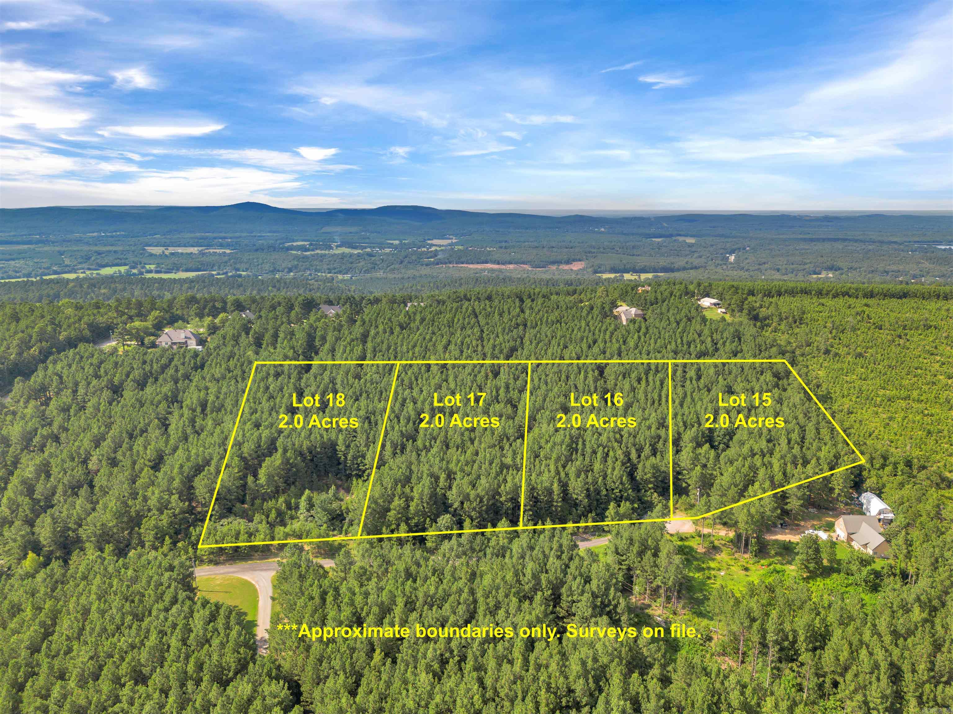 This listing is for Lot #18 in Big Rock Estates Subdivision. Discover this beautiful wooded lot located in the desirable Big Rock Estates subdivision in Perry County. This property is located right by the Ouachita National Forest and surrounded by Potlatch Deltic lands. Surrounded by beautiful custom-built homes, this lot offers a peaceful setting for your future home. Purchase individually or combine multiple lots for more acreage. A minimum of 1,800 sq/ft is required for new construction. Mobile and manufactured homes are not permitted. City water and electricity are available at the road, and fiber internet is accessible. Septic system installation will be required.