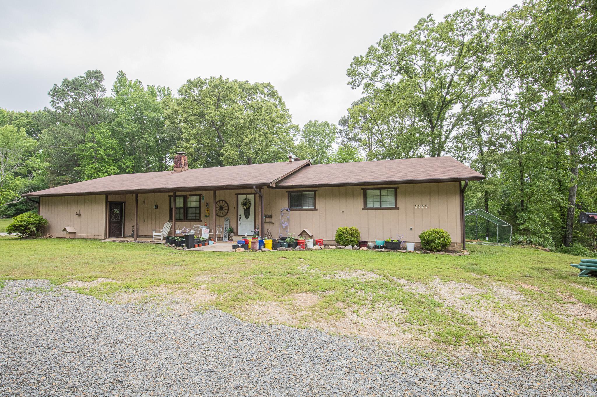 Take a look at this ranch style country home in Prattsville! This 2027 sq ft country retreat blends rustic charm with thoughtful updates, making it the perfect place to call home.  Built in 1979 , this well maintained property offers space & comfort inside & out.  Step inside to find a remodeled kitchen, a dining area featuring concrete countertops, gas stove & updated finishes.  Wood accent beams & the vaulted ceiling make this the most inviting space in the home! The cozy living room is highlighted by a wood stove fireplace with striking rock accents, perfect for those chilly nights.  The spacious primary suite boasts a nicely tiled shower & the hall bath offers double vanity and a tub shower combo with tile details.  Additional highlights include: Added mudroom for extra storage and convenience.  Covered back porch for relaxing and enjoying the outdoors.  2 car garage & a 20x24 shop with electricity, concrete floors, double doors & window unit.  On the home the roof was replaced in 2016, Ac installed 2016 & newer light fixtures. There is a gas water heater & gas furnace.  Sitting on 1.42 acres, this home provides room to spread out. 24 HR SHOWING NOTICE.