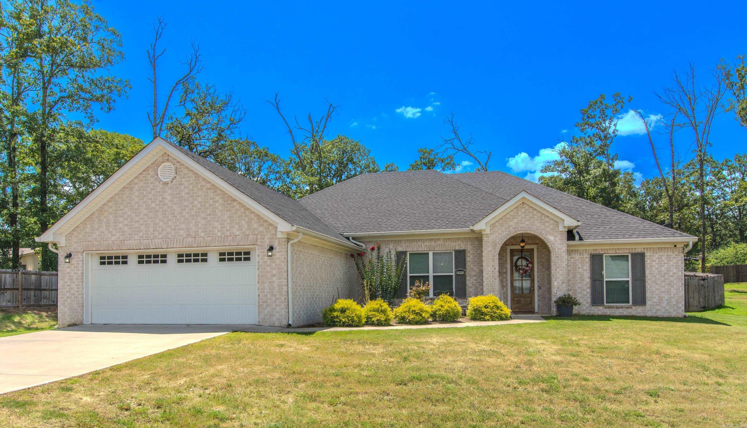 *NO RESTRICTIONS* NO HOA* Built in 2021 and still like new, this beautiful home offers 3 bedrooms plus an office with stylish sliding barn doors just off the open living room. The living area features a cozy gas fireplace and flows seamlessly into the kitchen, which includes expanded cabinetry, granite countertops, and a spacious layout perfect for entertaining. The oversized primary suite boasts a walk-in tiled shower and a large walk-in closet. Oversized Guest bathroom and large walk in closets in both guest bedrooms. So much storage throughout the home. Situated on a .46-acre lot with a fully fenced backyard storage building with additional lean-to, there’s plenty of space to enjoy the peaceful, country setting. Conveniently located just 20 minutes from Benton or West Little Rock. ***See agent remarks.