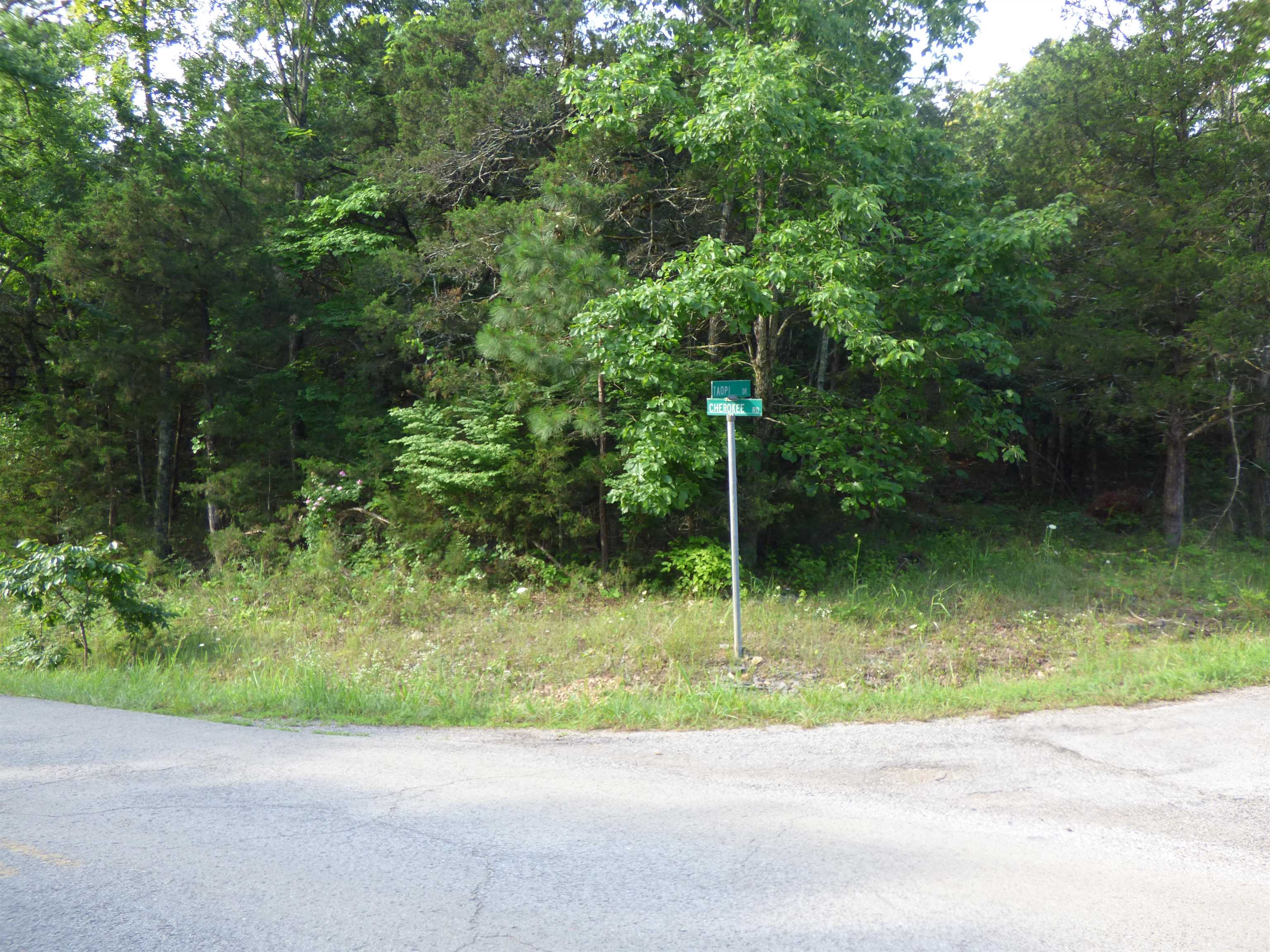 Build your your dream with room to breath.  This rare opportunity includes 6 combined lots totaling nearly 2 acres on Cherokee Rd. Whether you are considering a custom home, extra privacy, room for a shop, or simply a peaceful place surrounded by nature this beautiful positioned corner anchored set of lots offer added accessibility and design possibilities. Utilities in area - Call for your showing today!