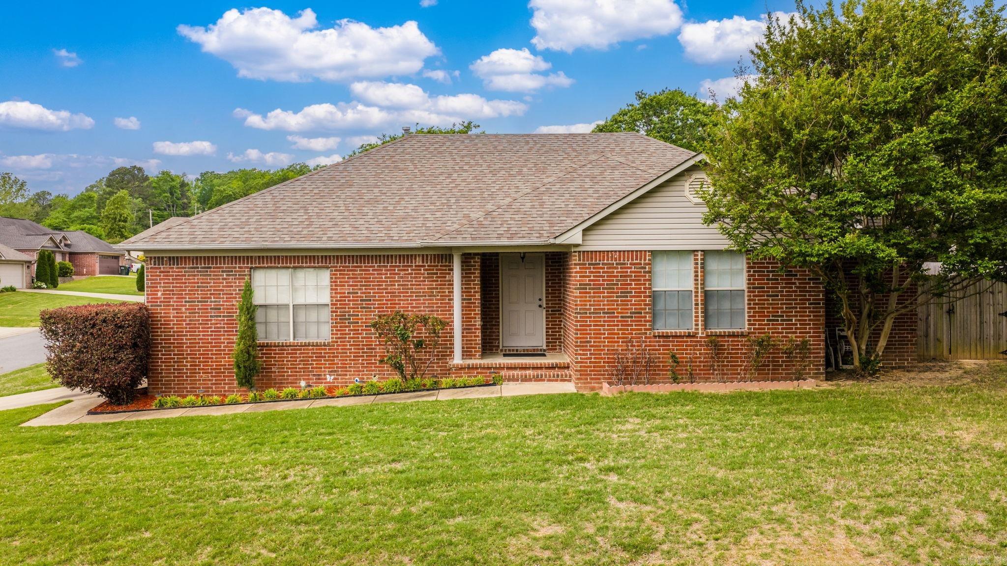 Very well maintained one-owner home located on a spacious corner lot in Westin Park with a brand new outside HVAC unit. This move-in ready 3-bedroom, 2-bath home offers 1,460 square feet of comfortable and functional living space in a convenient Conway location.    Inside, you’ll find a welcoming living area with wood flooring and a tray ceiling that adds character to the space. The layout flows easily into the kitchen and dining area, creating a practical setup for everyday living and entertaining. The kitchen offers ample cabinet and counter space along with a breakfast bar.  The primary suite features a tray ceiling, generous space, and direct access to the backyard, creating a private retreat. The additional bedrooms offer flexibility for guests, a home office, or hobbies.  Step outside to enjoy the covered patio and extended deck, perfect for relaxing or hosting. The backyard is fully fenced and provides plenty of space to enjoy the outdoors. Situated in an established neighborhood with easy access to shopping and dining, this home offers a great combination of location, comfort, and value.