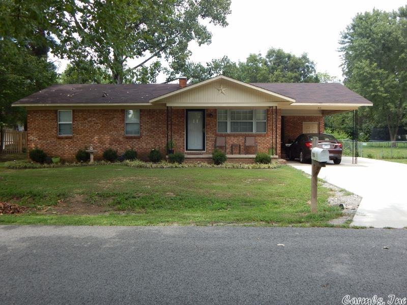 3 bedroom, brick home with a large yard that is partially fenced, great landscaping, new roof in 2016, 30X30 shop with an electric door, storage building, nice concrete patio, and a concrete driveway new in 2016!  The kitchen includes stainless steel appliances!  Within walking distance to school. Don't miss out on this great deal!