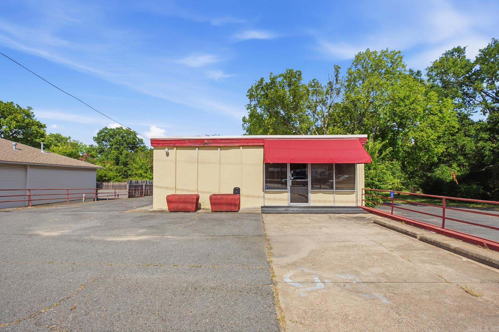 Unlock the potential of this highly visible commercial property located at 1601 S. University Avenue in the heart of Little Rock. Situated on 0.68± acres that consist of two parcels with approximately 2,460 square feet of space, this C-2 zoned property offers exceptional flexibility for investors, owner-users, or businesses looking to establish a presence along one of the city's busiest areas. Formerly operated as a medical office, the building is well suited for a variety of professional, medical, retail, office, or service oriented businesses. The property features excellent street frontage on University Avenue, providing outstanding signage opportunities and maximum exposure to thousands of vehicles traveling this area each day. Its central location places you just minutes from major hospitals, educational institutions, retail centers, and countless established businesses, making it an ideal location to attract both drive-by and destination traffic. Property lines are for visualization and may not be accurate, measuring is highly encouraged.