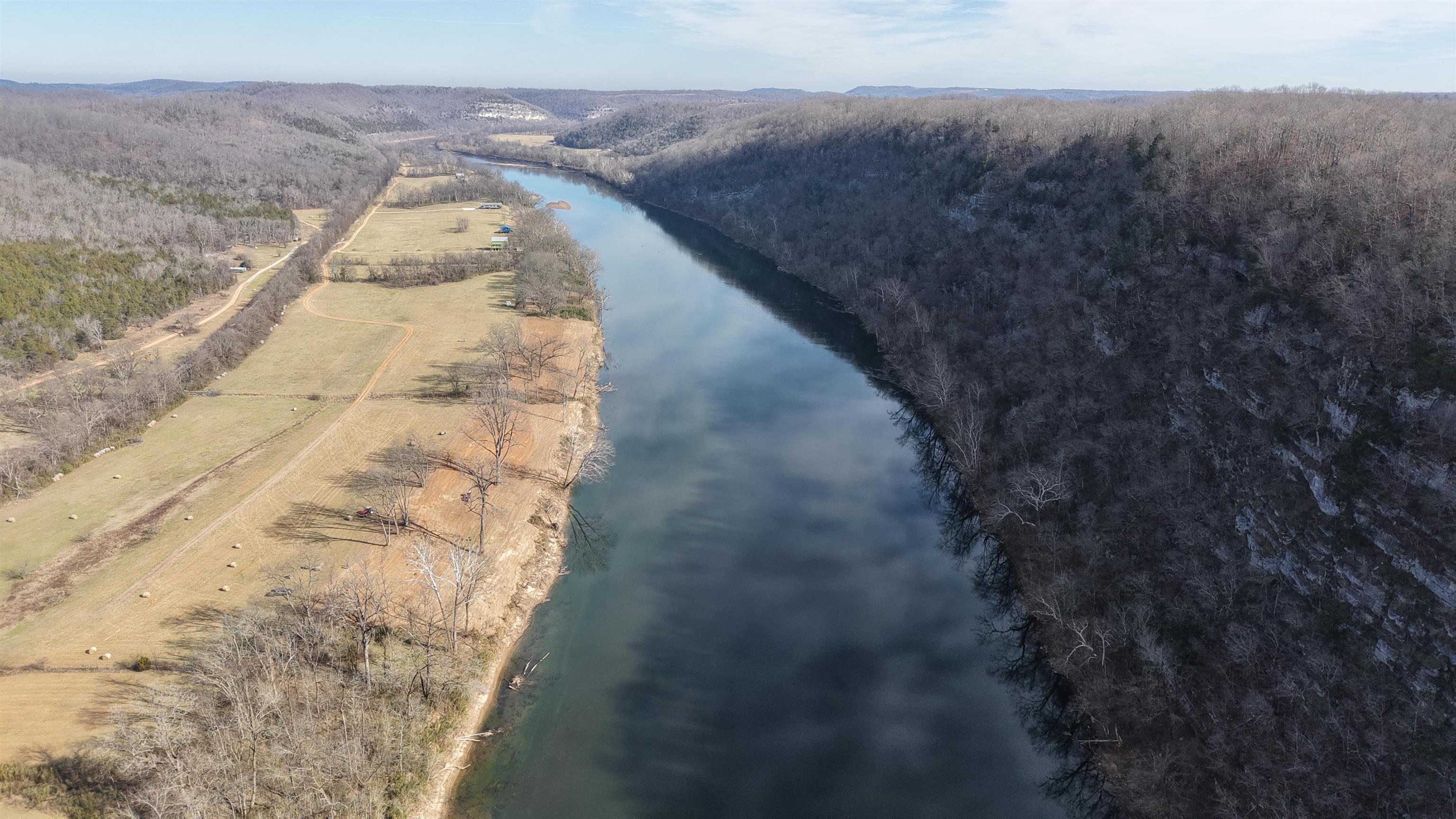 Experience the beauty of the White River from this 0.89-acre subdivision lot, offering pristine river frontage. This stretch of the White River is known for its scenic views, with large limestone bluffs and clear waters, perfect for premium trout fishing right in your front yard!  A short 10-minute boat ride brings you to the riverside community of Guion, Arkansas or two of the finest restaurants upstream in Sylamore—Anglers White River Resort and JoJo’s Catfish Wharf at Jack’s Resort—both overlooking the river unbeatable views.  Frequent sightings of deer, turkey, bald eagles, and other wildlife also make this location a nature lover's dream.  Don't miss this chance to own a piece of the White River! Priced at $78,500. The seller also has additional river lots available!