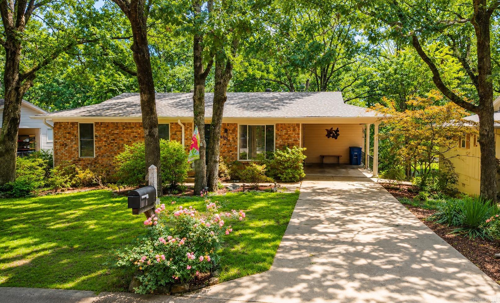 This one of a kind floor plan is just waiting for your ideas to make it your OWN!  Home is conveniently located just off North Hills Blvd and has been loved by the same family for over 30 years! The unique floor plan actually has 5 Bedrooms if you need that many. The 2 smaller bedrooms would also be ideal for a home office, workout room, craft room, man cave, or nursery. 3 BR 1 BA on main level and 2 BR 1 BA on lower level. Several updates including new roof and water heater 2024, HVAC with ducts also cleaned 2025, new LVP flooring 2025. Home has a laundry chute, under stair storage, and under house storage. Enjoy the park like back yard from the upper deck off the kitchen/dining area or from the walk out patio from downstairs primary bedroom! The hot tub w convenient retractable cover will convey to new owner as well as the 8 x 10 storage shed.