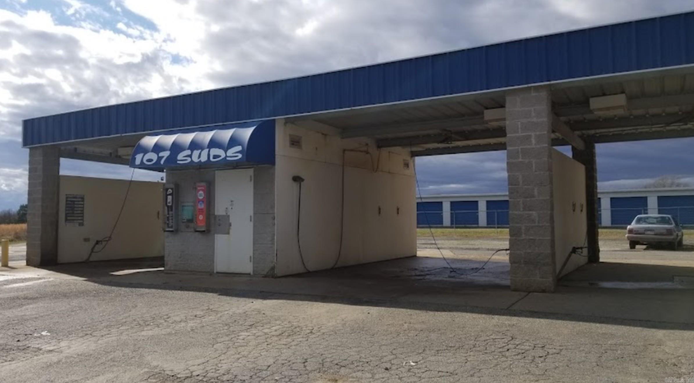 3-bay car wash with 3 vacuums.