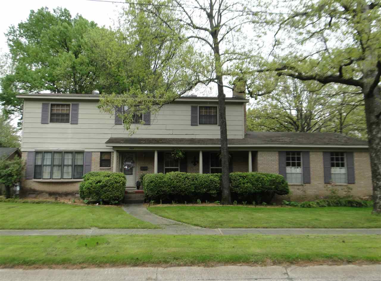 Lovely home nicely situated on a large level corner lot in Midtown.  Hardwood flooring throughout the home including all 4 bedrooms. The home has a warm and inviting den with beamed ceiling and gas fireplace with brick hearth. The formal living and dining are open and adds a sense of spaciousness to the home. Nice galley style kitchen opens to the fenced backyard with a series of decks providing space for outdoor entertaining or just enjoying a relaxing evening. Side loading garage. Much More!