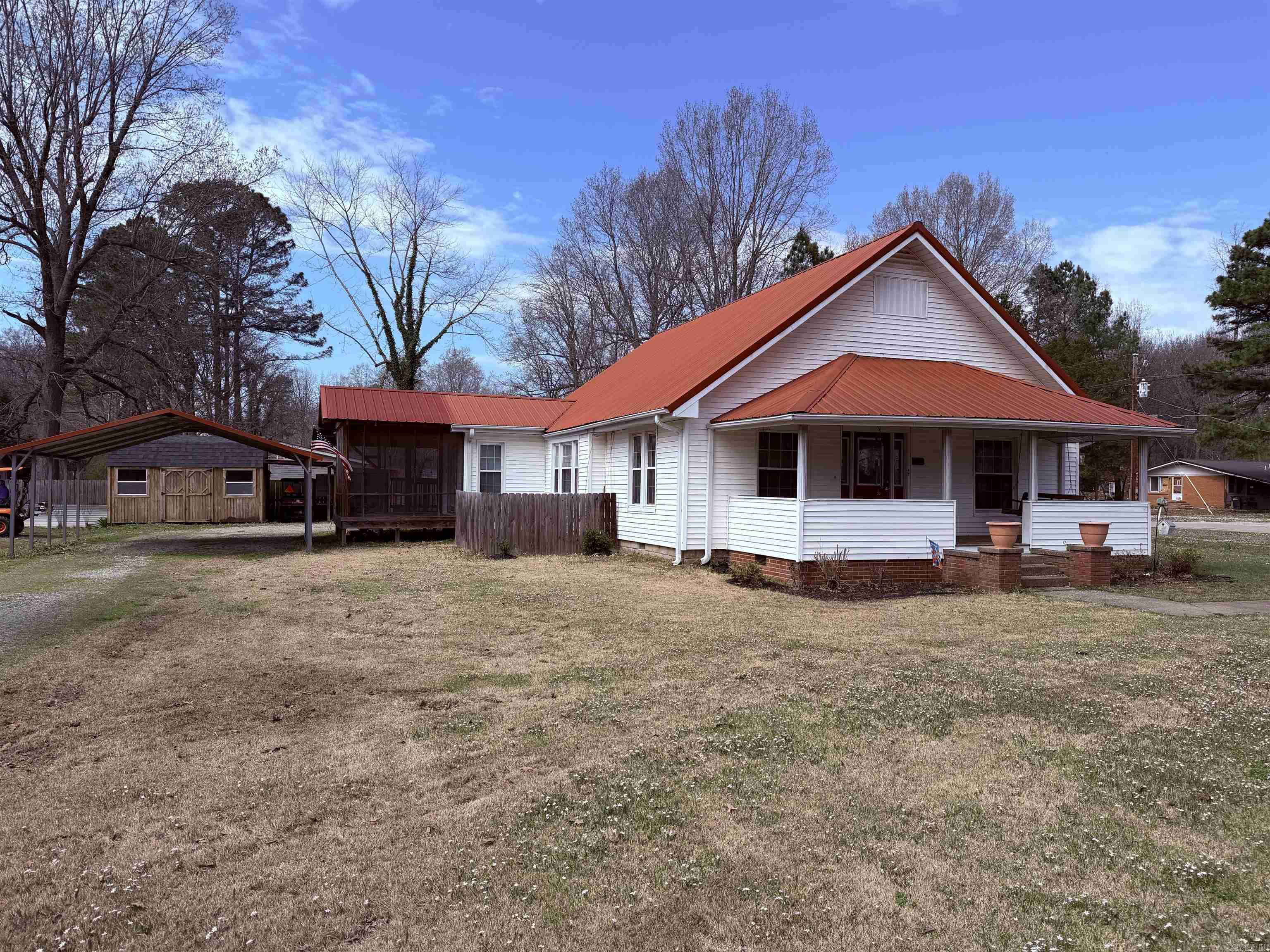 Welcome to this charming and move-in ready home located at 217 S. 12th Ave. in Piggott, AR! Situated on a spacious 0.40-acre corner lot, this well-maintained property offers 1,519 square feet of comfortable living space with 3 bedrooms and 1 full bathroom.  This home features a brand-new HVAC system for year-round comfort and a durable metal roof for long-lasting peace of mind. Inside, you'll find an inviting layout complemented by new kitchen appliances, making it perfect for everyday living and entertaining.  Enjoy the outdoors from the screened-in porch, ideal for relaxing mornings or quiet evenings. The property also includes a 2-car carport, a 1-car garage, and a convenient storage building, providing ample space for vehicles, tools, and hobbies.  With its combination of updates, functional space, and desirable corner lot location, this home is truly move-in ready and waiting for its next owner. Don't miss this great opportunity!