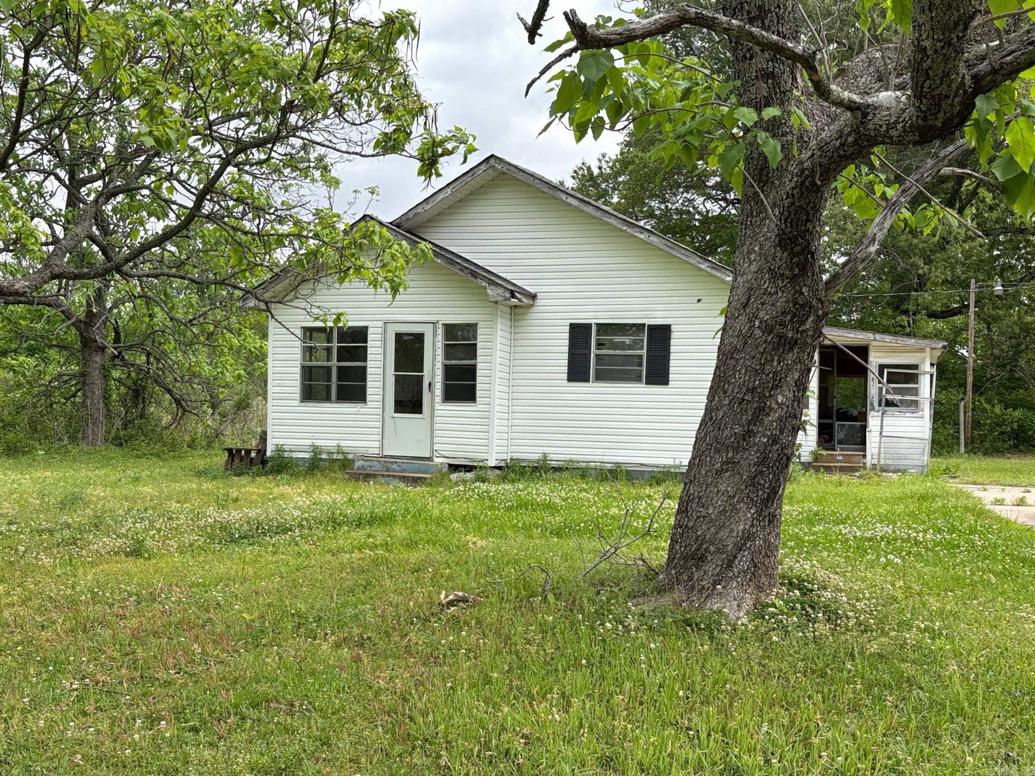 Beautiful 2 acres of land but house needs lots of TLC. Please see agent remarks.
