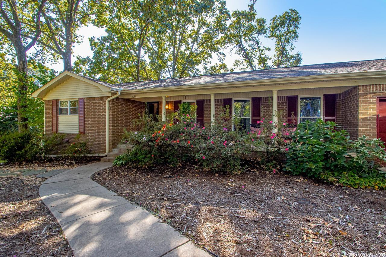 WOW! WOW! WOW! One house down from the lake & yes...you have access! Go through the back gate, walk down est 50 ft, tada! Lake views from the sun porch & screened in porch! This is the one you have been looking for! So many updates! Heat & Air! Roof! HWH! Kitchen totally updated! Granite! Vinyl Windows! Newly painted inside! Whole house generator! Hot Tub for 8 conveys! Sprinkler system front & back! New 8 ft fence! Hook up for RV! Crazy great!! This home has room for everyone! Upstairs Living/Dining Rm! Open floor plan for Kitchen & Family room! Opens to sun porch and screened in porch! 2 bdrms on main level! Downstairs~Den! Built out office~you will love! 2 bdrms w/full bath!  2 Buckstove fireplaces that work on remotes! Fabulous house! Come see it! Come Buy it! Come enjoy Christmas here in Lakewood on Topf! It is move in ready! Super Convenient location! Meticulously cared for & loved on! 1056 additional sq ft heated/cooled workshop, storage space & exercise room in the house bringing the total heated/cooled sq ft to 4569 sq ft!