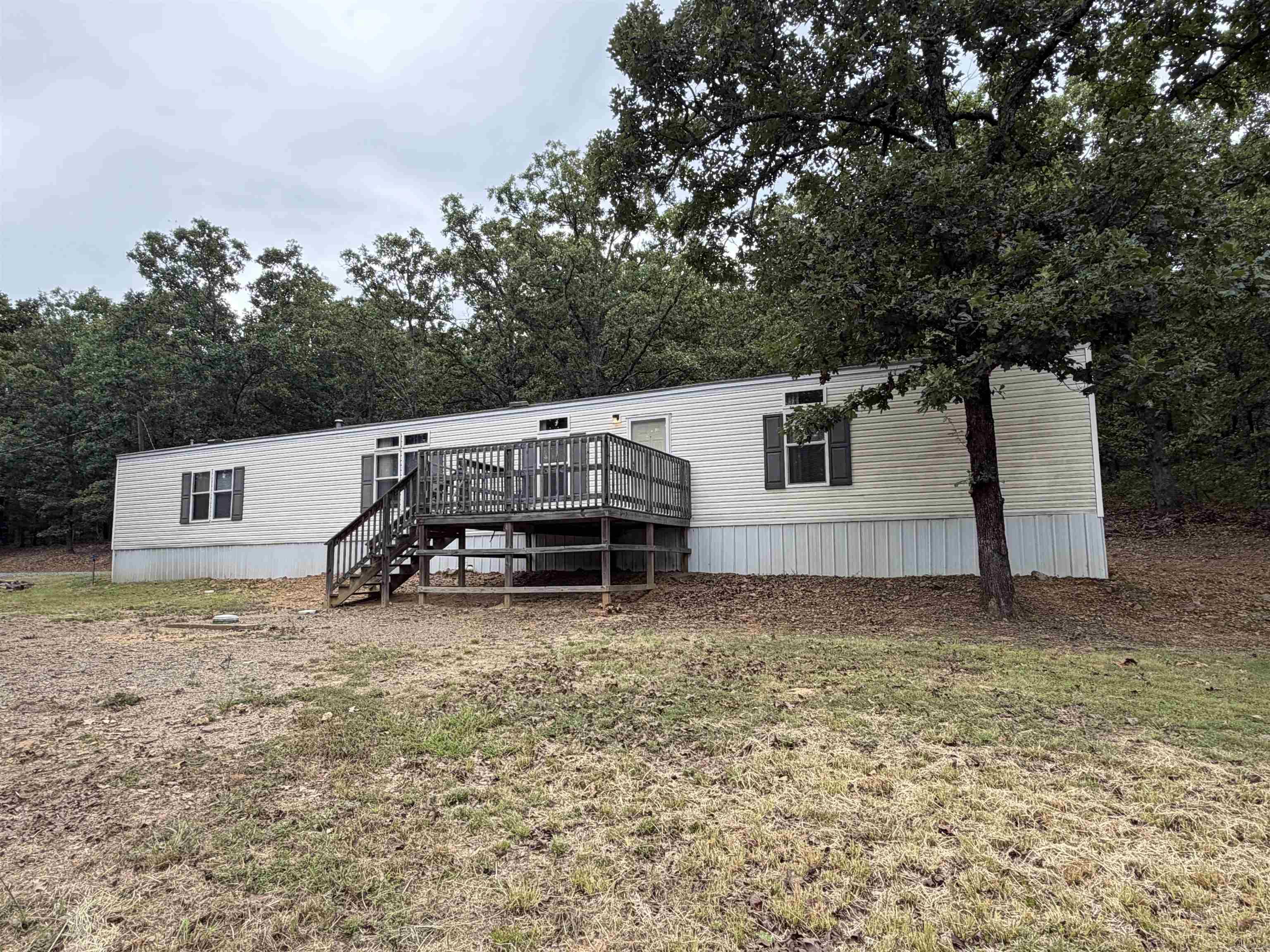 Peaceful country living on 3 acres. This meticulously maintained mobile home offers the perfect blend of comfort, functionality, and outdoor enjoyment, with beautiful views and plenty of space to spread out. Enjoy the setting from the front and rear decks, ideal for relaxing and taking in the surrounding landscape. Whether you're looking for a peaceful retreat,  or a property with room to work and play, this one stands out. All appliances convey at no value. Mobile Home is on a permanent foundation.
