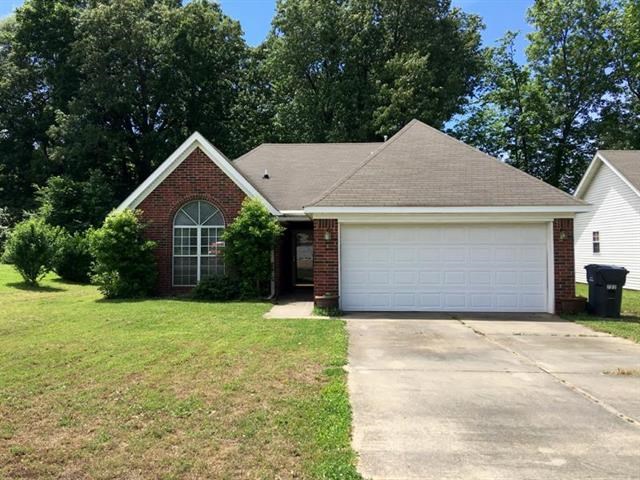 This amazing three bedroom and two bath home will not last long! It has plenty of natural light with large windows, a two car garage, new laminate hardwood floors in living room, screened in porch, gas fireplace, open kitchen/dining room, plenty of storage, and a large fenced backyard. The washer, dryer, and refrigerator will remain with property.