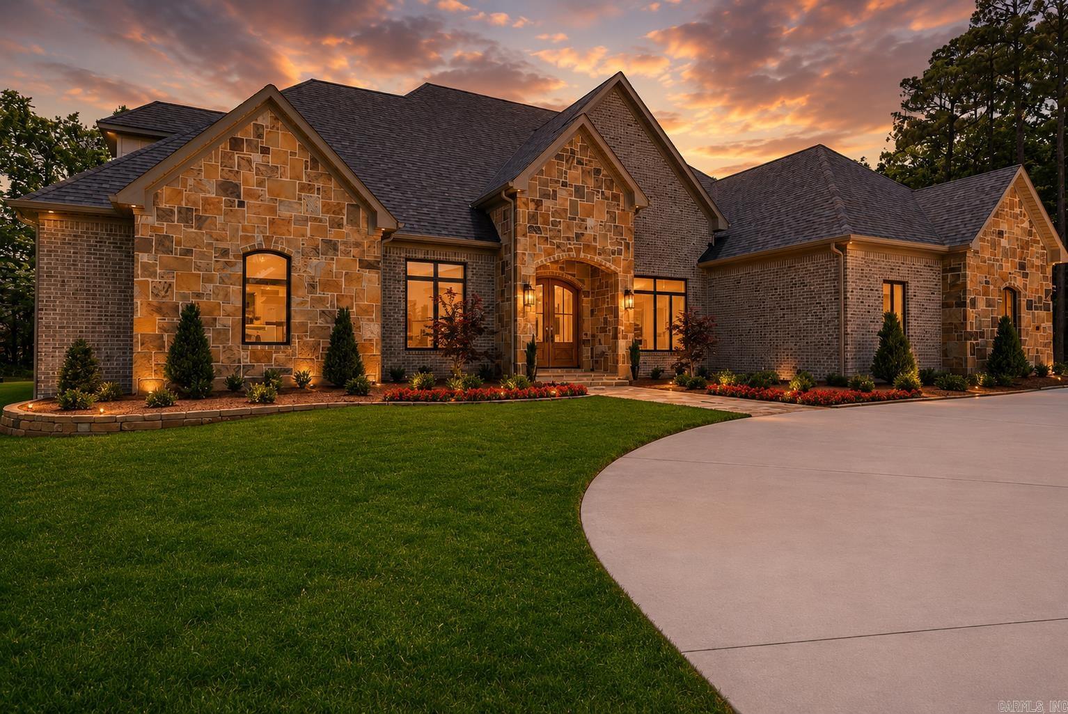 Located in the gated & prestigious Orle community of Chenal, this custom home delivers the perfect blend of thoughtful design, refined finishes, & everyday functionality. The floor plan was made for entertaining, with a custom kitchen, dedicated bar area with ice maker and beverage drawers, and a cozy den with fireplace just off the kitchen and breakfast nook. An expansive terrace with a remote-controlled screen system creates seamless indoor-outdoor living and overlooks one of the best flat lots in the neighborhood, framed by mature trees with quick trail access to the course at your back door. Multiple bonus spaces offer flexibility, including a separate office, an upstairs bonus room ideal for a family game room, & a designated movie theater for elevated movie nights at home. The owner’s suite feels like a private retreat with a steam shower, separate soaking tub, separate vanity areas, & a boutique-style closet. An additional room off the owner’s bath offers the perfect space for a home gym, yoga studio, or expanded closet. Complete with a three-car garage plus separate golf cart garage, this home is filled with custom details & intentional spaces throughout. Virtually staged.