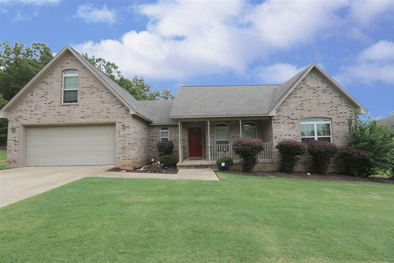 Nice home with an open floor plan in a great neighborhood. Wood laminate flooring in the entry, hall and the dining room. kitchen has an abundance of cabinet and counter space and is complete with smooth surface range, built in microwave and dishwasher. Spacious master bedroom and bath with jetted tub, walk in shower, double vanity and walk in closets.  Laundry with storage. Bonus room up.  Great deck overlooks huge backyard.