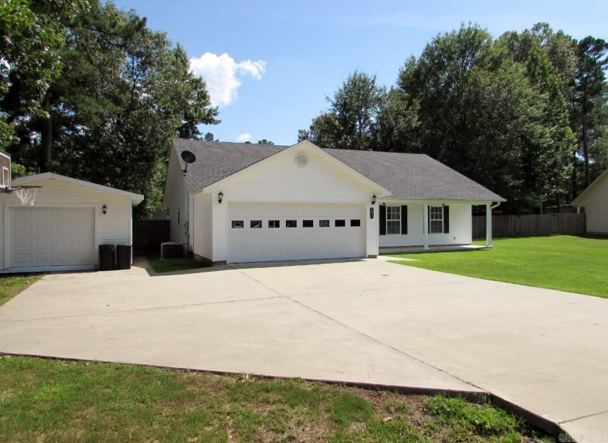 This home has it all*very well maintained and move in ready*flooring is either hardwoods or ceramic tile*not carpet in house*nice size kitchen with HUGE walk in pantry*nice big living room*shop compliments the house*wonderful backyard with huge grilling area underneath nice covered deck for entertaining-there is a grill, small fridge, built in in benches, bar and also a fire pit*