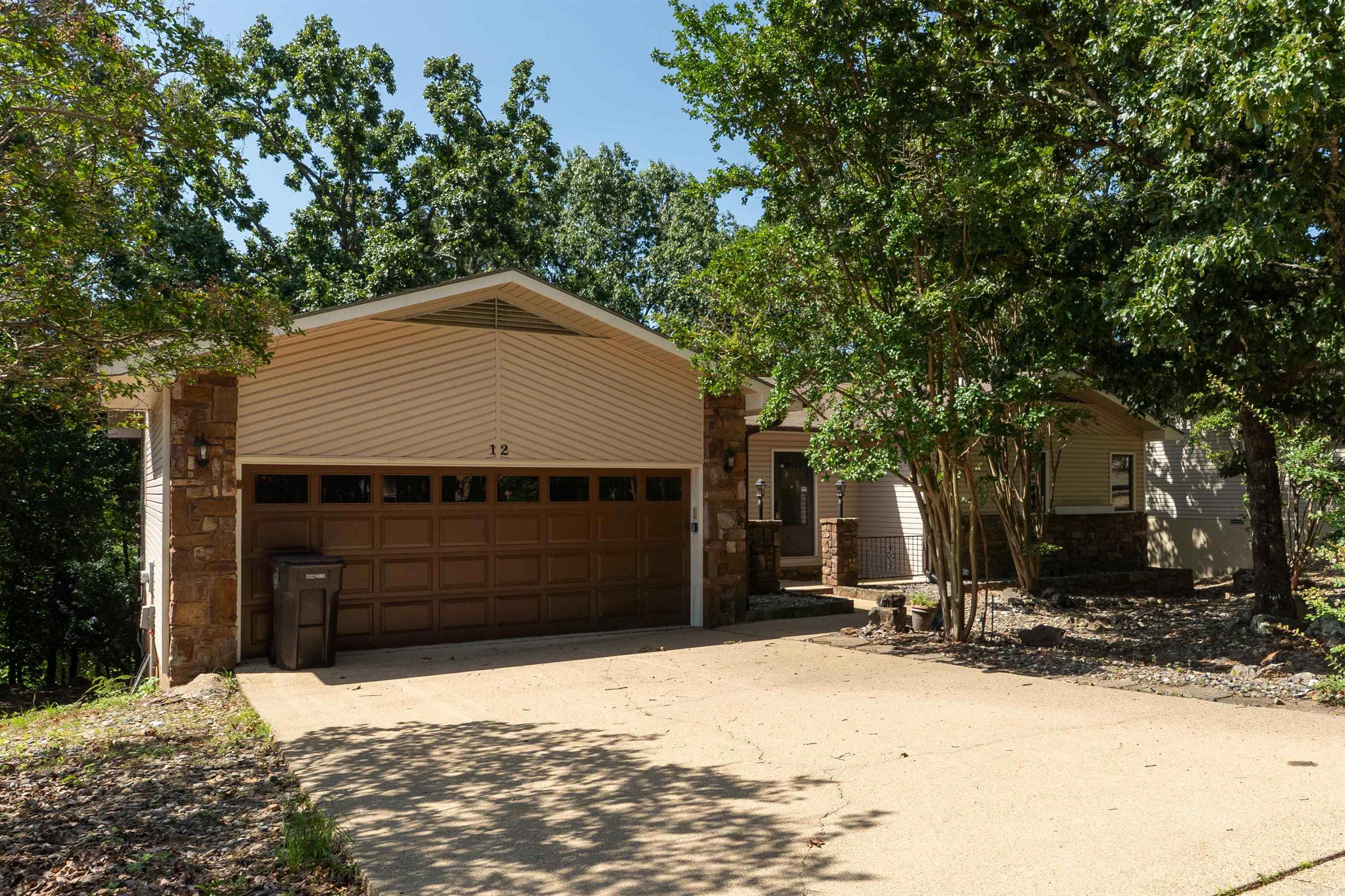 Experience true waterfront living with this beautifully remodeled lakefront home on Lake Pineda. Positioned to capture sweeping water views, this 3-bedroom, 3-bath property offers the ideal balance of comfort, functionality, and lifestyle.  Inside, the open living and dining area centers around a cozy fireplace and flows effortlessly into a sunroom designed to showcase the lake. The updated kitchen features new appliances, refreshed finishes, and durable LVP flooring that runs throughout the home, creating a clean, cohesive feel. All bathrooms have been thoughtfully updated.  The oversized laundry room includes a utility sink and abundant storage. A dedicated workshop, separate craft room, and additional storage space provide flexibility for hobbies, lake gear, or future customization.  Outdoors, the expansive deck invites grilling, entertaining, or quiet evenings overlooking the water.  Located just minutes from Village amenities, recreation, and everyday conveniences, this home offers both serenity and accessibility. Lakefront opportunities like this on Lake Pineda are limited.   Schedule your private showing and experience the lifestyle. Seller willing to pay $2,000 buy in fee.