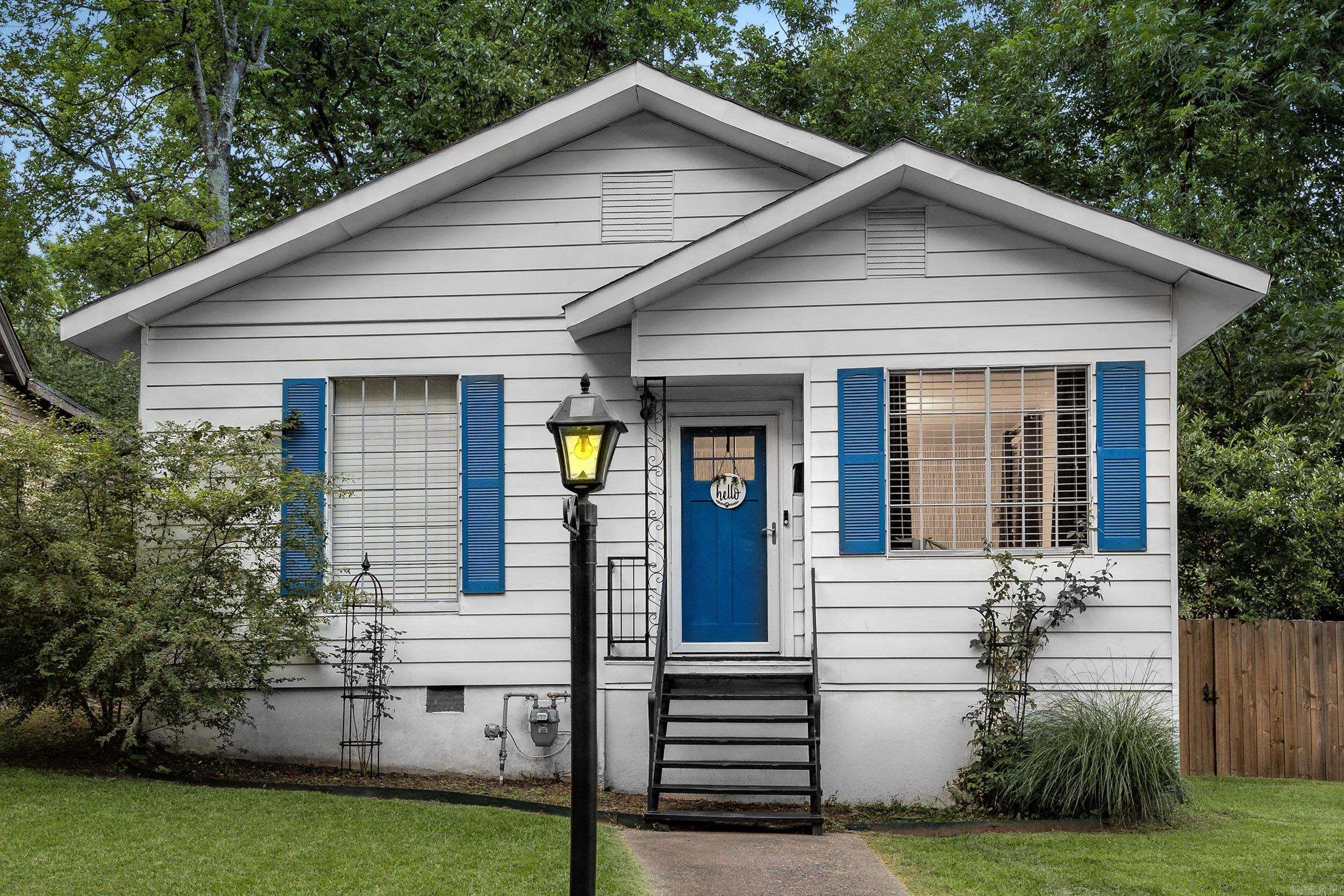 Fantastic one-level home combines charm, thoughtful updates, & unbeatable convenience in a prime central location walking distance to UAMS, Hillcrest, & more! Welcoming front porch opens into an airy, open-concept living & dining area featuring high ceilings, large windows, & abundant natural light. Fresh interior paint, new light fixtures, & an inviting eat-in kitchen w/ custom concrete countertops, gas stove & vent-a-hood, ample counter space & a cozy breakfast nook. The spacious primary bedroom includes 2 closets w/ tons of natural light, while the oversized updated bathroom features a large double vanity w/ granite countertops & a tub/shower combination. Additional improvements include new privacy fencing on three sides, new water line, added bedroom wainscoting, new garbage disposal, an upgraded bathroom vent fan, & more! Off the kitchen, the laundry room provides ample storage, & the private fenced backyard offers a large deck perfect for entertaining. Home was successfully used as a short-term rental during travel, consistently earning extra income—an exceptional opportunity! This move-in-ready property is truly a standout!!