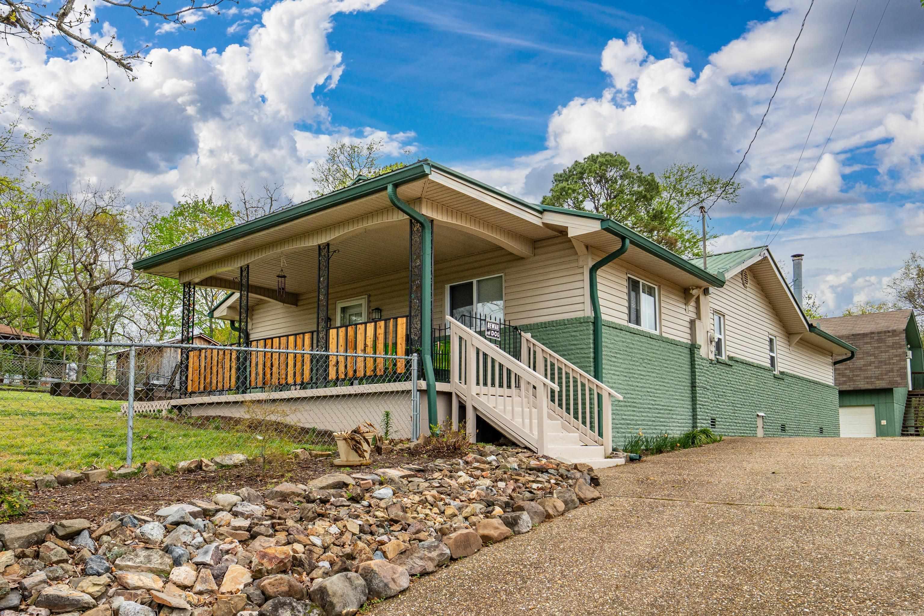 Meticulously maintained and move-in ready, this charming 3-bedroom, 2-bath home offers the perfect blend of comfort, functionality, and future potential.   The large kitchen has all stainless steel appliances and prep space galore. It adjoins the living room with a cozy fireplace and room for entertaining.  The property showcases a beautifully landscaped garden providing a great opportunity to grow your own food or unwind with nature. The shop and garage provide plenty of space for hobbies, storage, or projects, making it as functional as it is appealing. There is even an outdoor shower! Adding even more value is the additional bonus space above the garage, perfect for a potential living unit, guest quarters, or a cozy retreat—the possibilities are endless. Whether you’re looking for extra room to grow, income potential, or just a unique space to make your own, this property delivers a rare combination of charm and flexibility.