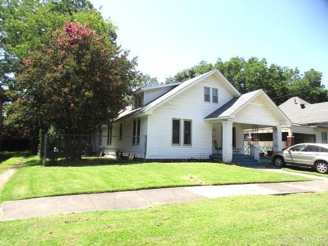 this charming home has 4 bedrooms and 2 baths, 2 living areas, lots of built-ins, 9' ceilings. This home has a brand new ch/a, roof is approximately 5 years old, some windows have been replaced. Wait till you see the attic space!!!  Attic is not heated and cooled, but just waiting for your updates. Hardwood floors in this home. Backyard is fenced. Taxes are before HC. Call today to see this home.