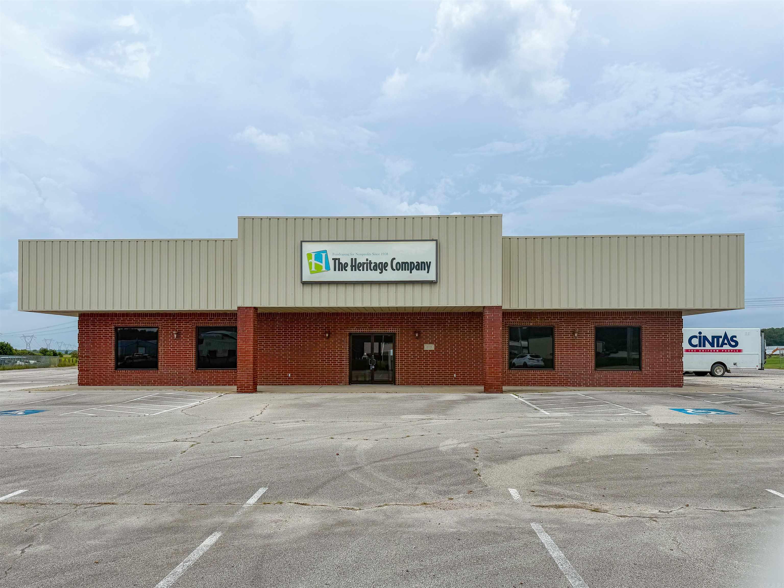Located along Highway 1 South, this commercial property offers a well-appointed office layout with ample parking and convenient access to Jonesboro. Positioned just outside the city limits in an established commercial and industrial area, the property is well suited for a corporate office, call center, training facility or other large-scale office user. The building also offers potential for adaptation to an office/warehouse operation.