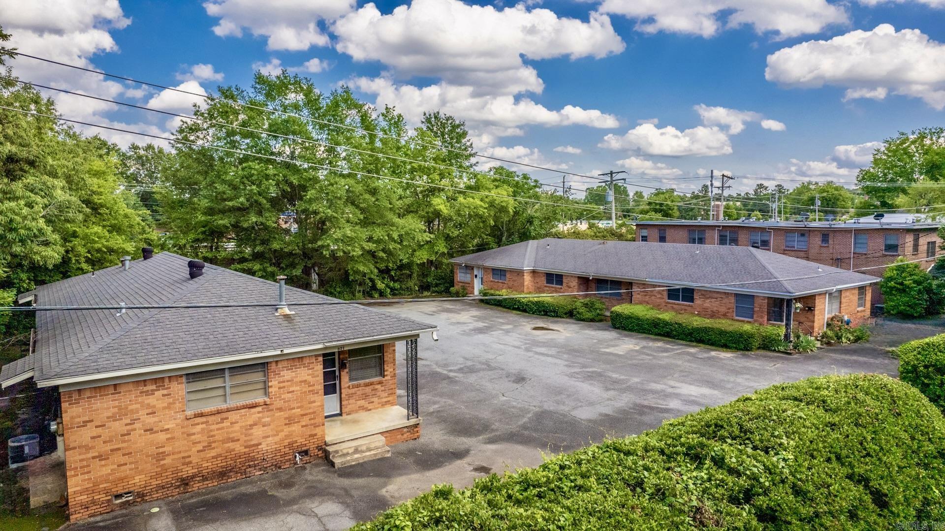 This is a a Triplex and Duplex on the same property saying the same parking lot just steps away from Midtown living. The Triplex consists of 2 bedroom, 1 bathroom units. The Duplex consists of 1 bedroom, 1 bathroom units. We are excited for you to consider this amazing investment opportunity. Please allow 48 hours notice for showings. The property is currently being rented short term and we will have to make sure we send you to the correct vacant units.