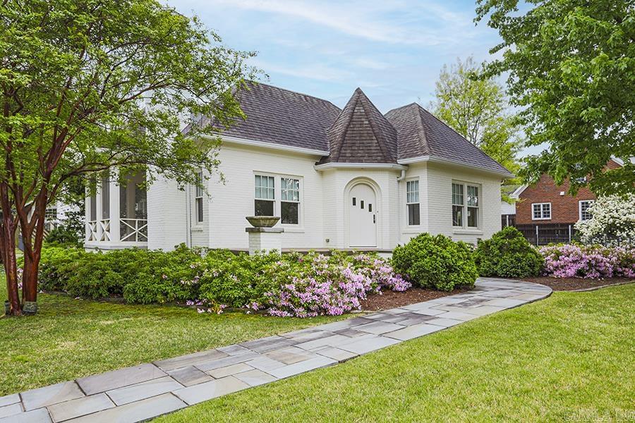 Absolutely charming remodeled bungalow on 2 lots. Completely renovated- new roof, windows, sheet rock, wiring, plumbing, ceiling joists and more. Also has home generator. Will not divide the two lots. Floored attic with permanent staircase in garage. Whole house generator. Sales price not subject to house appraising for sale's price.  Property being sold AS IS.