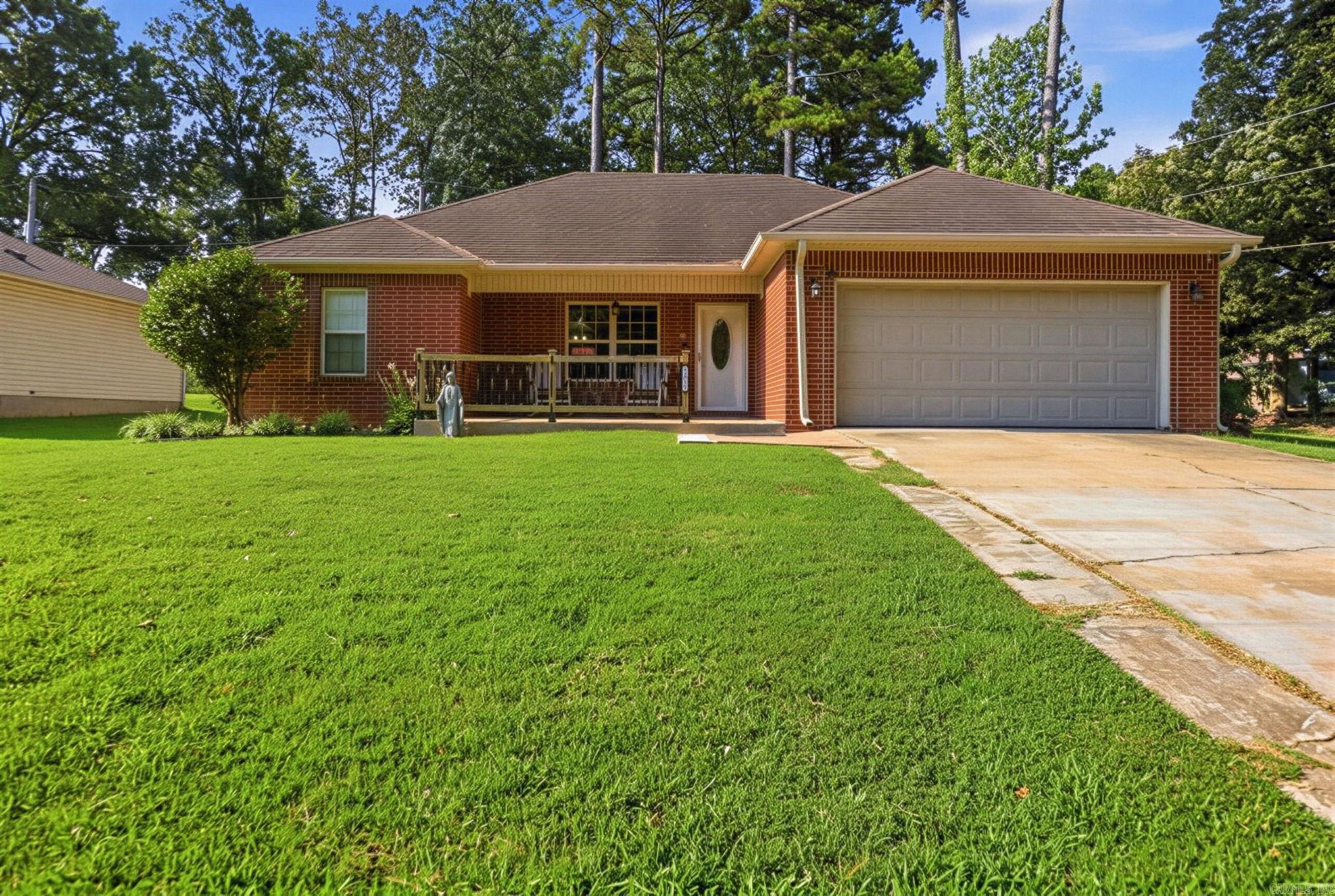 Welcome home to this beautifully maintained 3BR/2BA home in a well-established neighborhood with no HOA! Just a short walk to Lake Cherrywood Park, stocked for fishing, plus a playground, basketball court, and nearby elementary school. Inside you’ll find no carpet, tray ceilings in the living room and primary suite, an updated kitchen with remodeled cabinets, countertops, newer sink, microwave, stove, and convenient pull-out trash cabinet. Enjoy a spacious eat-in kitchen, inviting covered front porch, 2-car garage, and a generously sized backyard with an extended concrete patio perfect for entertaining. Updated light fixtures and vanities throughout. See Agent Remarks for a complete list of updates.