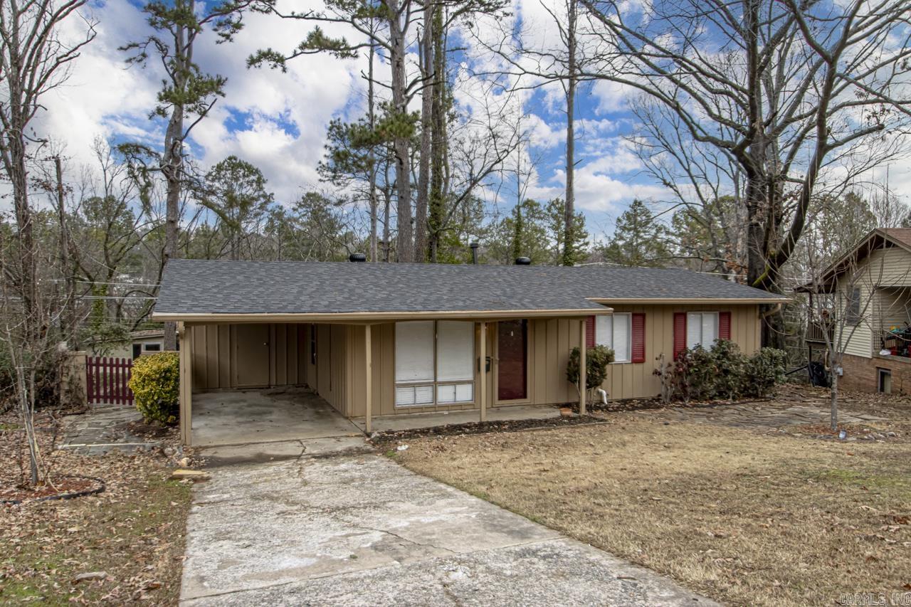 Welcome to 202 Springwood Drive, a charming residence nestled in the heart of Little Rock, AR! This meticulously maintained 3-bedroom, 1-bathroom home is a perfect blend of comfort and style. Recent upgrades include a brand-new roof and a modern sewer line, ensuring peace of mind for years to come.  The spacious interior boasts a warm and inviting atmosphere, with ample natural light enhancing every corner. The well-appointed kitchen features contemporary amenities, making meal preparation a delight. Enjoy cozy evenings in the living room, creating lasting memories with loved ones.  With a convenient carport, parking is a breeze, and the absence of houses to the rear provides a serene backdrop for your backyard oasis. Whether you're hosting gatherings or simply unwinding after a long day, the outdoor space offers endless possibilities.  Located in a desirable neighborhood, 202 Springwood Drive is close to schools, parks, and all the amenities Little Rock has to offer. Don't miss the opportunity to make this house your home – schedule a showing today and experience the comfort and convenience this property has to offer. Act fast, as homes like these are a rare find!