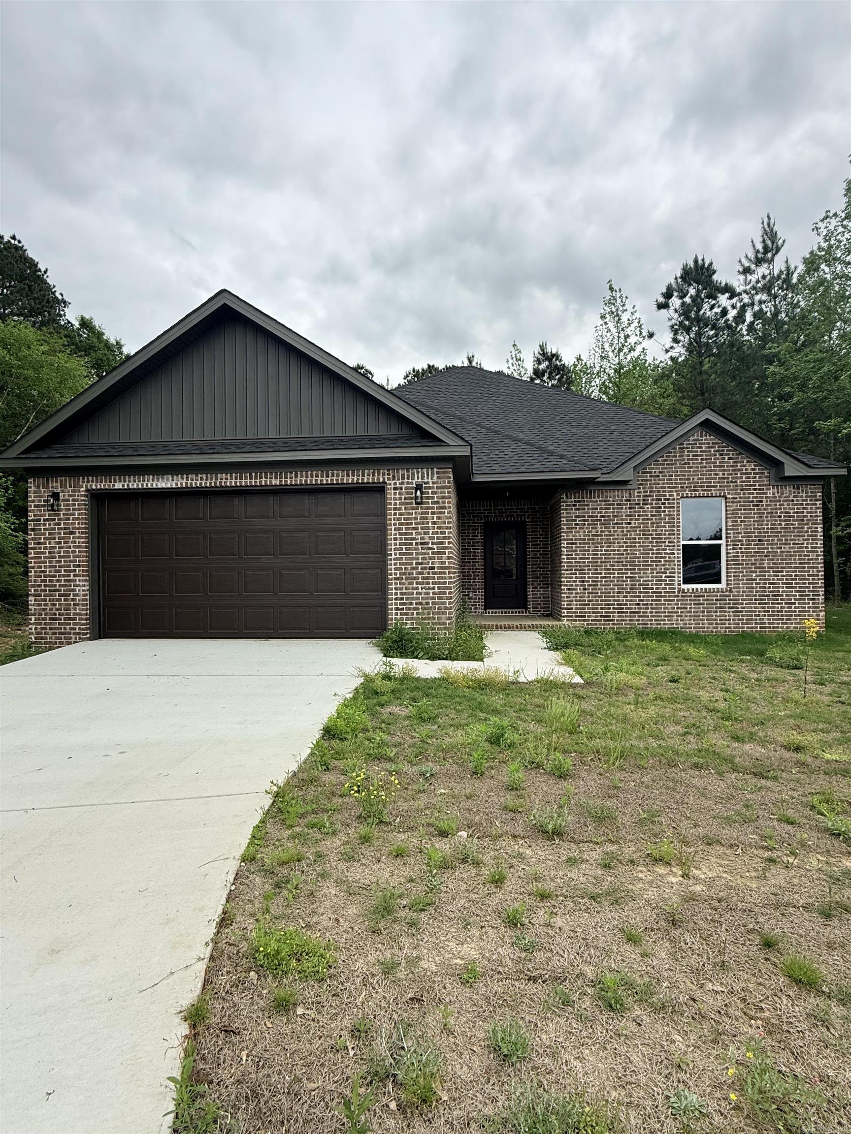 Welcome to your brand-new home at the end of a quiet cul-de-sac in the desirable Meadow Creek subdivision of Haskell, AR. This thoughtfully designed residence combines modern finishes with everyday convenience, making it perfect for families or anyone looking for a fresh start.  Step inside to find luxury plank vinyl flooring throughout, offering both durability and style. The spacious open floor plan creates a seamless flow from the living room to the kitchen and dining area. The kitchen features granite countertops, custom cabinetry, and all-electric appliances, ready for both weeknight dinners and weekend entertaining.  The primary suite includes a spa-like bath with a beautifully tiled walk-in shower, double vanities, and a large walk-in closet. Additional bedrooms are generously sized, offering comfort and flexibility for family, guests, or a home office.  Located just minutes from Harmony Grove Schools, this property offers the peace of cul-de-sac living while keeping you close to town amenities. With modern construction, quality finishes, and a prime location, this home is move-in ready and built to impress.  **Room to grow! Adajacent lot available for purchase.**