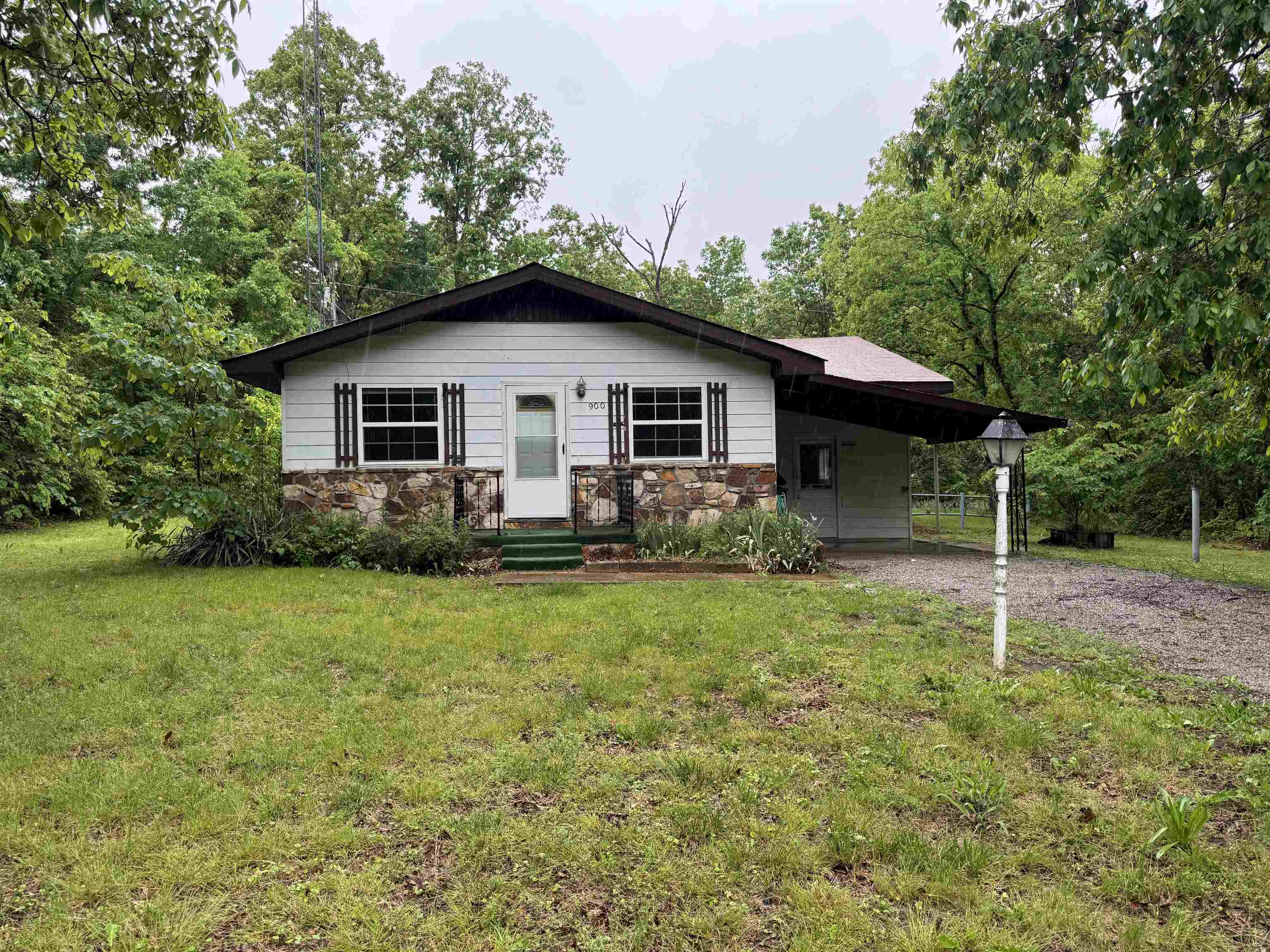 Tucked away in a peaceful neighborhood, this charming 2 bedroom, 1 bath home offers the perfect blend of quiet living and functional workspace. Whether you're a craftsman, a gardener, or looking for your first renovation project, this property is brimming with potential. The home has central electric heat/wall air. Features of this property include: The Workshop: A standout feature! A massive workshop/laundry combo provides ample room for tools, hobbies, or a home business.  The Outdoors: Enjoy a fully fenced backyard-ideal for pets or privacy.  Bonus Storage: Includes an additional storage building in the back (ready for your finishing touches). Appliances Included: Comes with a stove and refrigerator. Note: Washer and dryer are included as-is (dryer is non-functional).