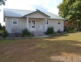 The property is located in the Welcome Home community approximately 17 miles from Marshall, AR 72650. The home sets on 5 acres +/- of cleared grass land with the rest of the property being wooded timberland. ATV trails and hiking trails run through out the property making it easy to connect with nature. There are several food plot areas throughout the property. No Mineral Rights Convey at Listing Price.