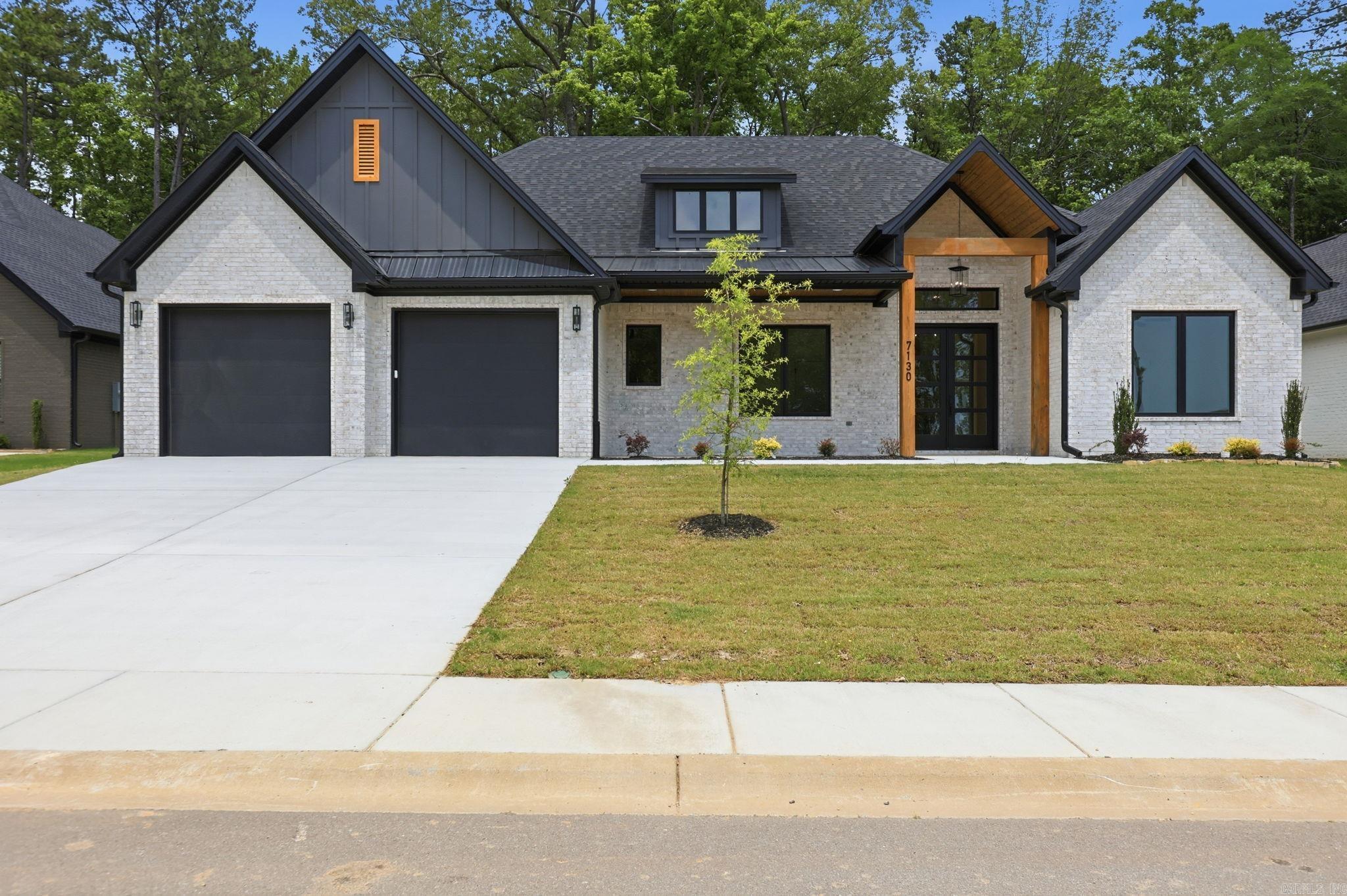 7130 Moon View Place is a brand new and move-in ready home located in Severn Landing in Hurricane Lake Estates. This 4 bedroom, 3 bathroom home offers luxury finishes throughout, including quartz countertops, an electric fireplace, and a coffee bar or butler’s pantry area. The thoughtful floor plan includes a 2-car garage and a convenient pantry pass-through from the garage, making everyday living easier. Outside, enjoy a fully fenced, flat backyard with plenty of usable space. A beautiful new construction home in one of Benton’s sought-after communities.