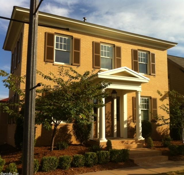 Here's your chance to have a home on Founder's Row. Lovely brick Greek Revival with open living area, amazing pantry, and master bedroom on main. Upstairs has 2 large bedrooms with a flex space which is perfect for video games, den, or sitting area for guests. There's a rear entry garage and an incredible outdoor living space on the side. Great location right in the middle of the neighborhood. Come join the fun of living in The Village at Hendrix.