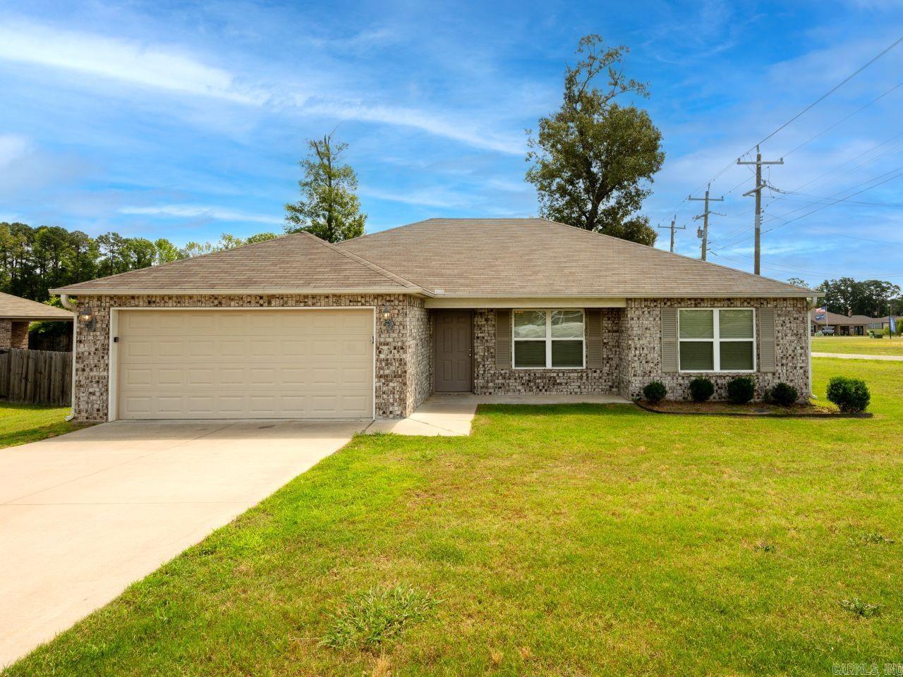 Beautiful home location just off of AR-89 South. The home features a split floor plan for added privacy. The kitchen has durable granite countertops and the living room includes a cozy fireplace. The primary bathroom has a soaking tub, a walk-in showing, and a large closet. Some pictures are digitally enhanced.