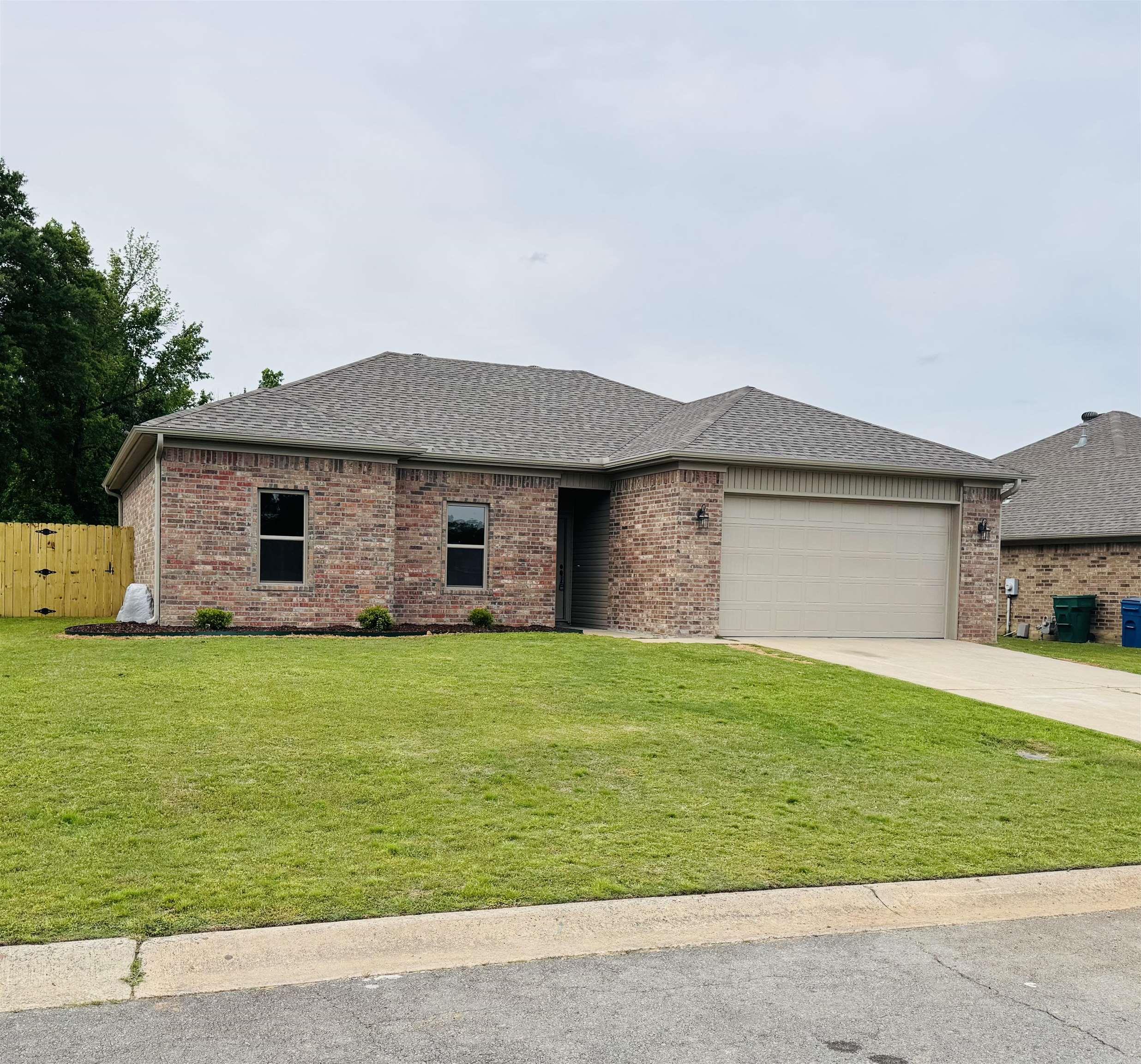 Check out this newly built 3 bedroom/2 bath home. Features granite countertops, stainless steel appliances, large island, laundry room/pantry, primary bath has walk-in shower with seat and fogless/heated mirrors (in both baths) with walk-in closets.  Large backyard with new privacy fence.  Home also has a nice 2 car garage with extra storage room.  Previous home burned and builder took it down to the footprint and rebuilt - everything is new.  This home is all electric.  Call for your showing today.