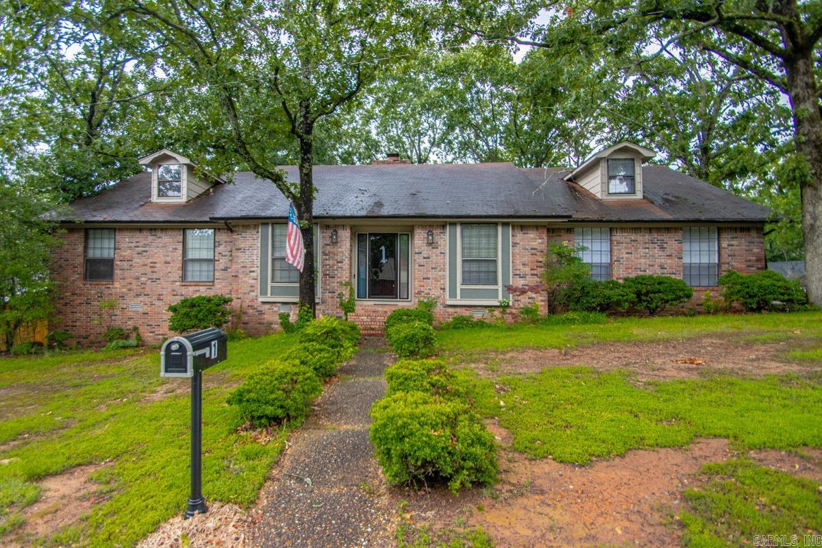 Located in the highly desirable Overbrook subdivision, this beautifully updated home offers the perfect blend of modern comfort and timeless charm. Inside, you'll find a spacious primary suite conveniently located on the main level, an open-concept living area with soaring vaulted ceilings, and a bright eat-in kitchen that truly serves as the heart of the home. A stylish bonus wine and/or coffee bar adds the perfect touch for entertaining guests or enjoying your morning routine. Unique character and thoughtful updates are showcased throughout, creating a warm and inviting atmosphere. Relax in the sunroom, entertain on the spacious back porch, or enjoy everyday living in a home designed for both comfort and functionality. Whether you're hosting family gatherings or enjoying quiet evenings at home, this exceptional property provides the perfect setting for making lasting memories.