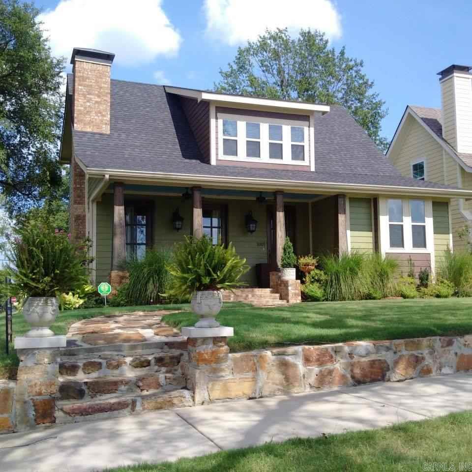 Stunning new construction in Hanger Hill. Three bedrooms, 2.5 baths, hardwoods, abundance of built-ins, stunning finishes, two living areas, sprinkler system, zoned heating and air, detached garage with alley access. stone retaining wall. Walking distance to everything downtown!