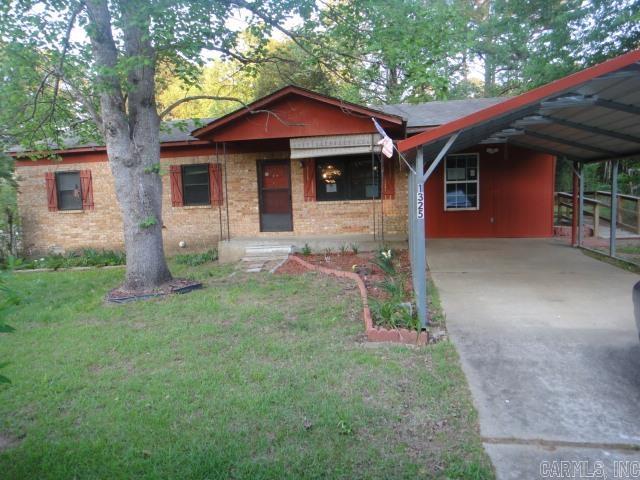 Home is close to Cleburne County Fairgrounds, located in a small subdivision. Home has a carport awning, handicap ramp, chain fence. Nice size back yard with 2 large storage buildings. See Agent Remarks for submitting an offer.