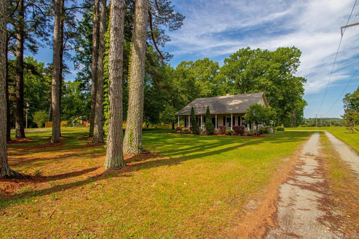 Spacious 3-bedroom, 2-bath home offering 2,025 square feet of comfortable living space on 2.88 beautifully maintained acres. The open floor plan creates a seamless flow between living, dining, and kitchen areas—perfect for both everyday living and entertaining. Enjoy a peaceful country setting while still being just minutes from shopping and dining.  The property features attractive landscaping and a versatile 30x40 shop, ideal for hobbies, storage, or workspace needs. Major updates include a new roof in 2019, water heater replaced in 2017, and a recently updated HVAC system with a new AC unit in 2026.  A perfect blend of space, functionality, and convenience—don’t miss this opportunity to enjoy country living with modern comforts.