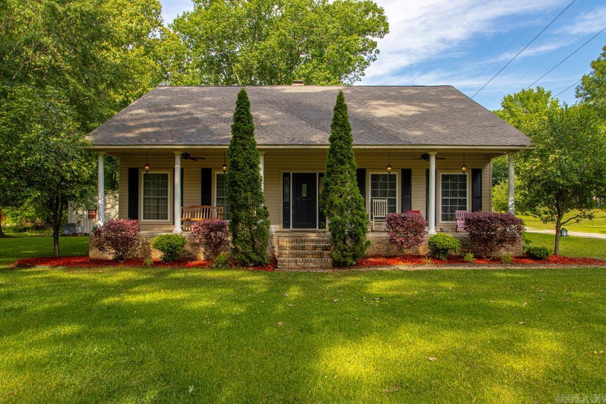 Spacious 3-bedroom, 2-bath home offering 2,025 square feet of comfortable living space on 2.88 beautifully maintained acres. The open floor plan creates a seamless flow between living, dining, and kitchen areas—perfect for both everyday living and entertaining. Enjoy a peaceful country setting while still being just minutes from shopping and dining.  The property features attractive landscaping and a versatile 30x40 shop, ideal for hobbies, storage, or workspace needs. Major updates include a new roof in 2019, water heater replaced in 2017, and a recently updated HVAC system with a new AC unit in 2026.  A perfect blend of space, functionality, and convenience—don’t miss this opportunity to enjoy country living with modern comforts.